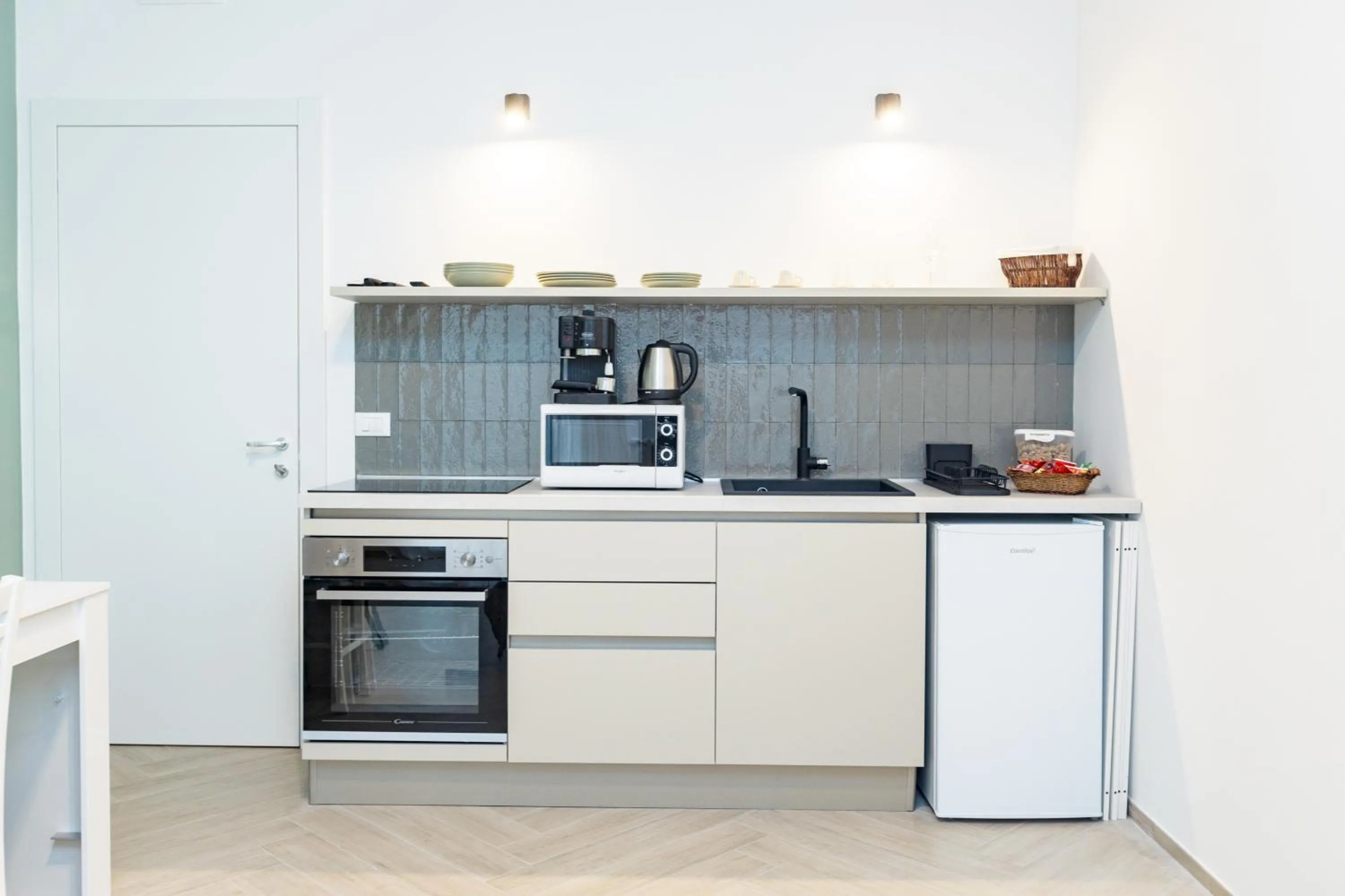 Kitchen or kitchenette in Porta del Salento APARTMENT