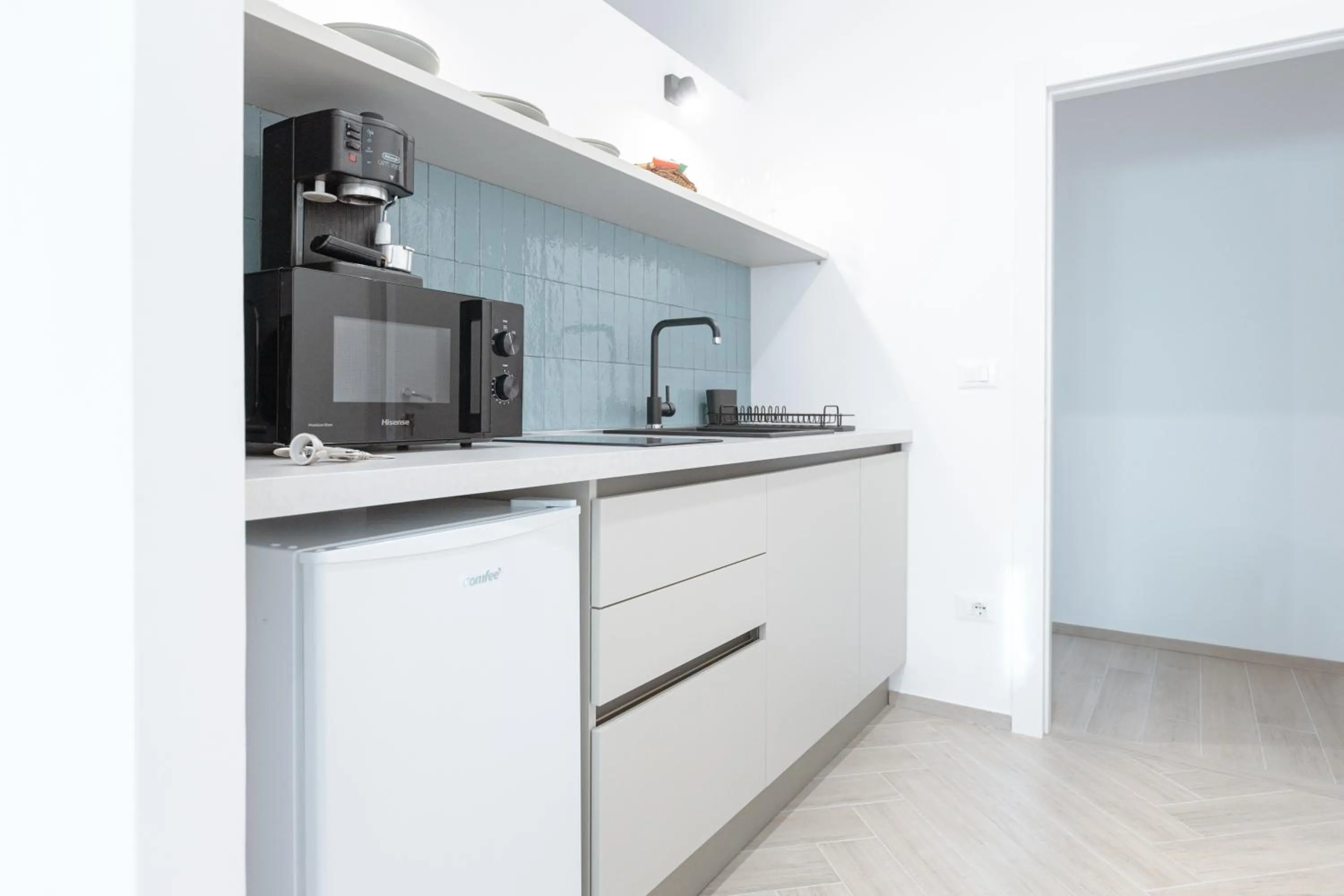 Kitchen or kitchenette in Porta del Salento APARTMENT