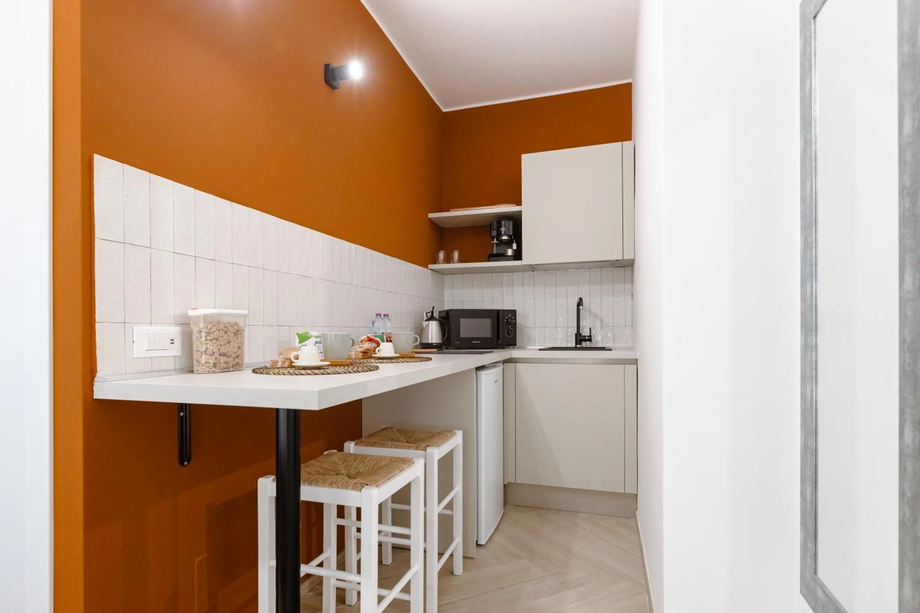 Kitchen or kitchenette in Porta del Salento APARTMENT