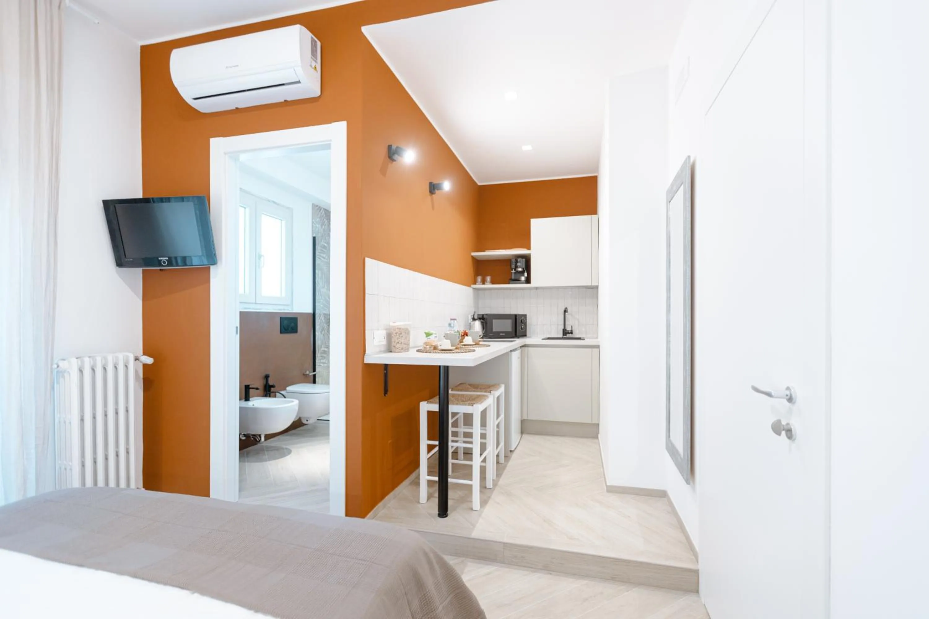 Kitchen or kitchenette, Bed in Porta del Salento APARTMENT