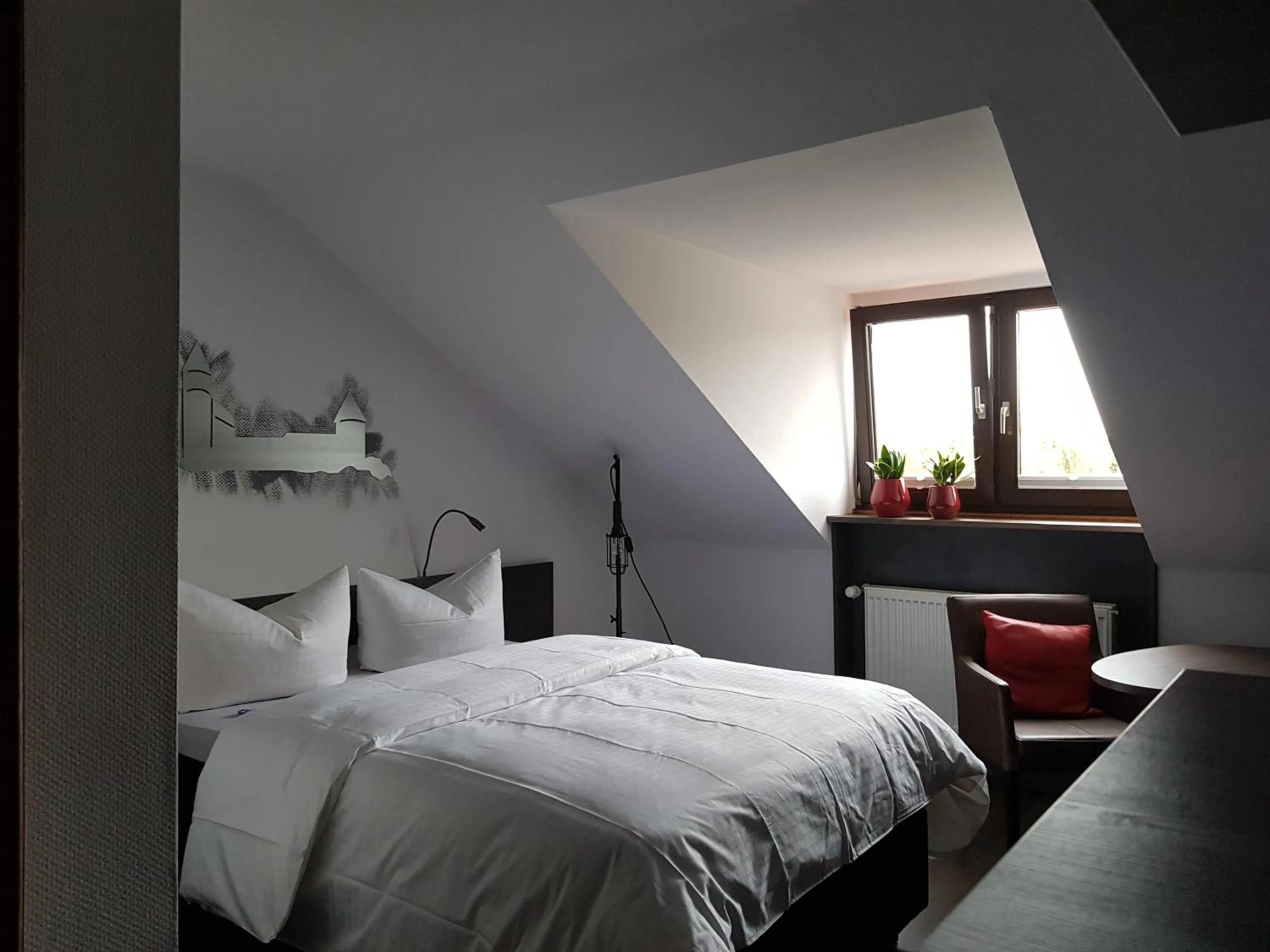 Photo of the whole room, Bed in Burghotel Pass