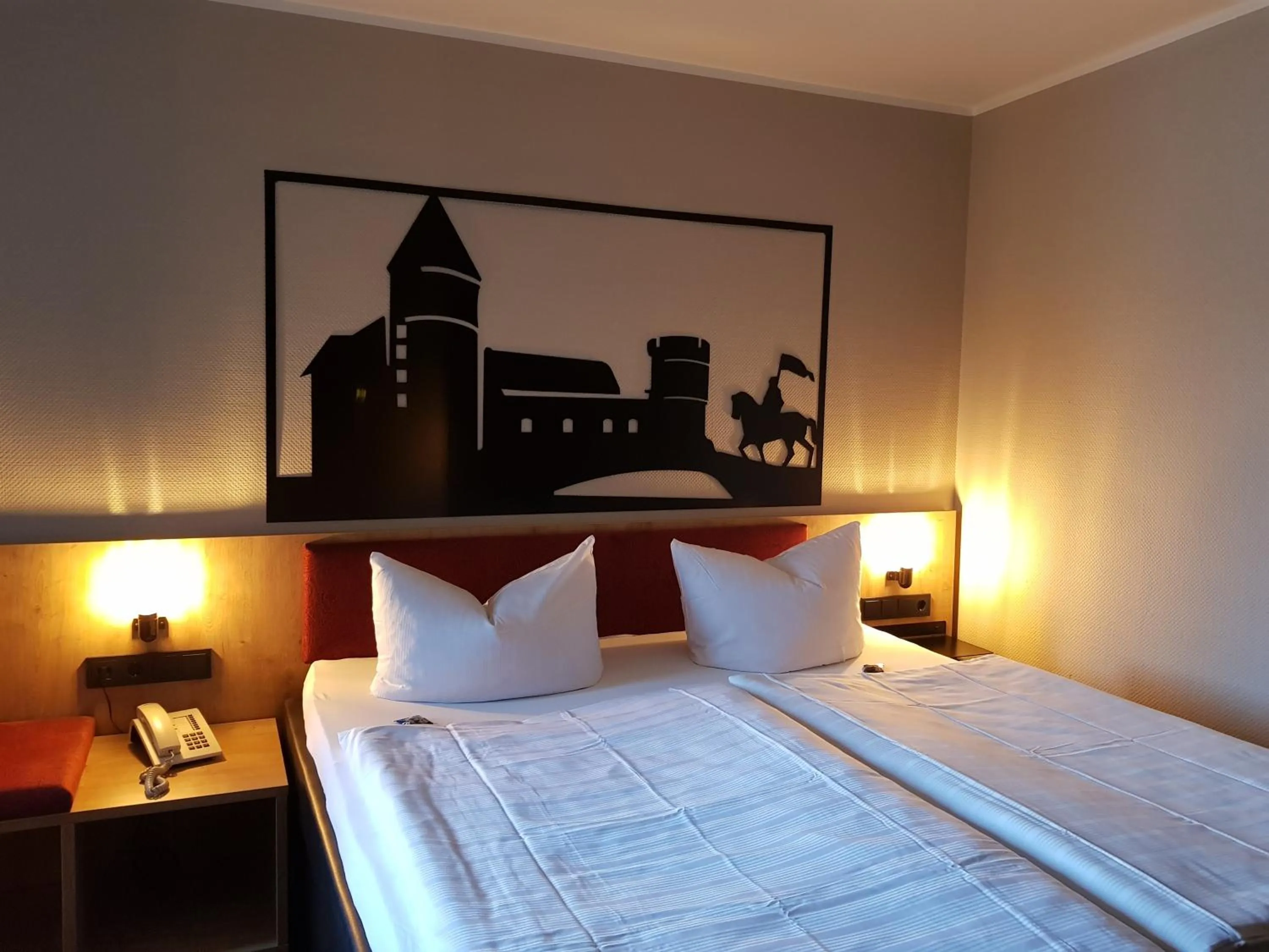 Photo of the whole room, Bed in Burghotel Pass