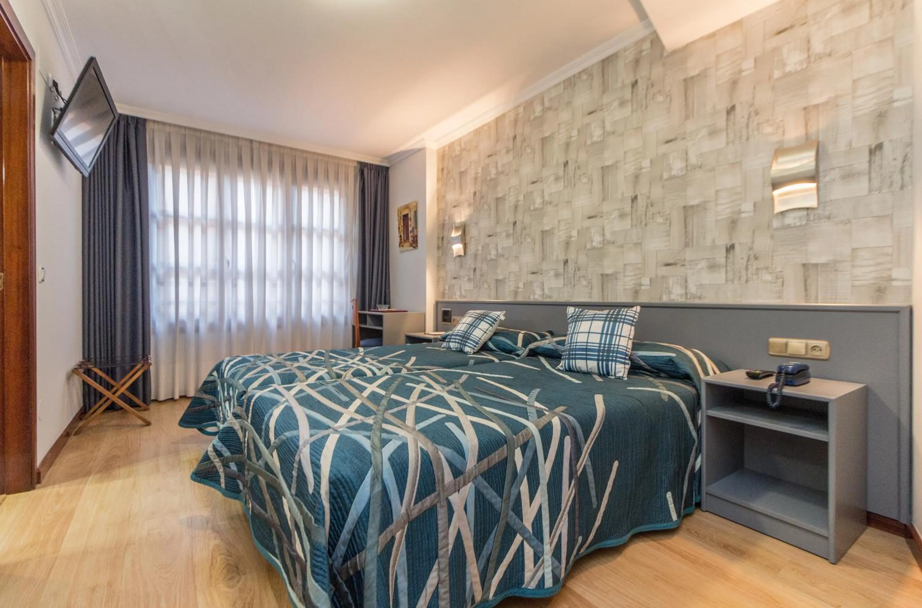 Bedroom, Bed in Hotel Gijon