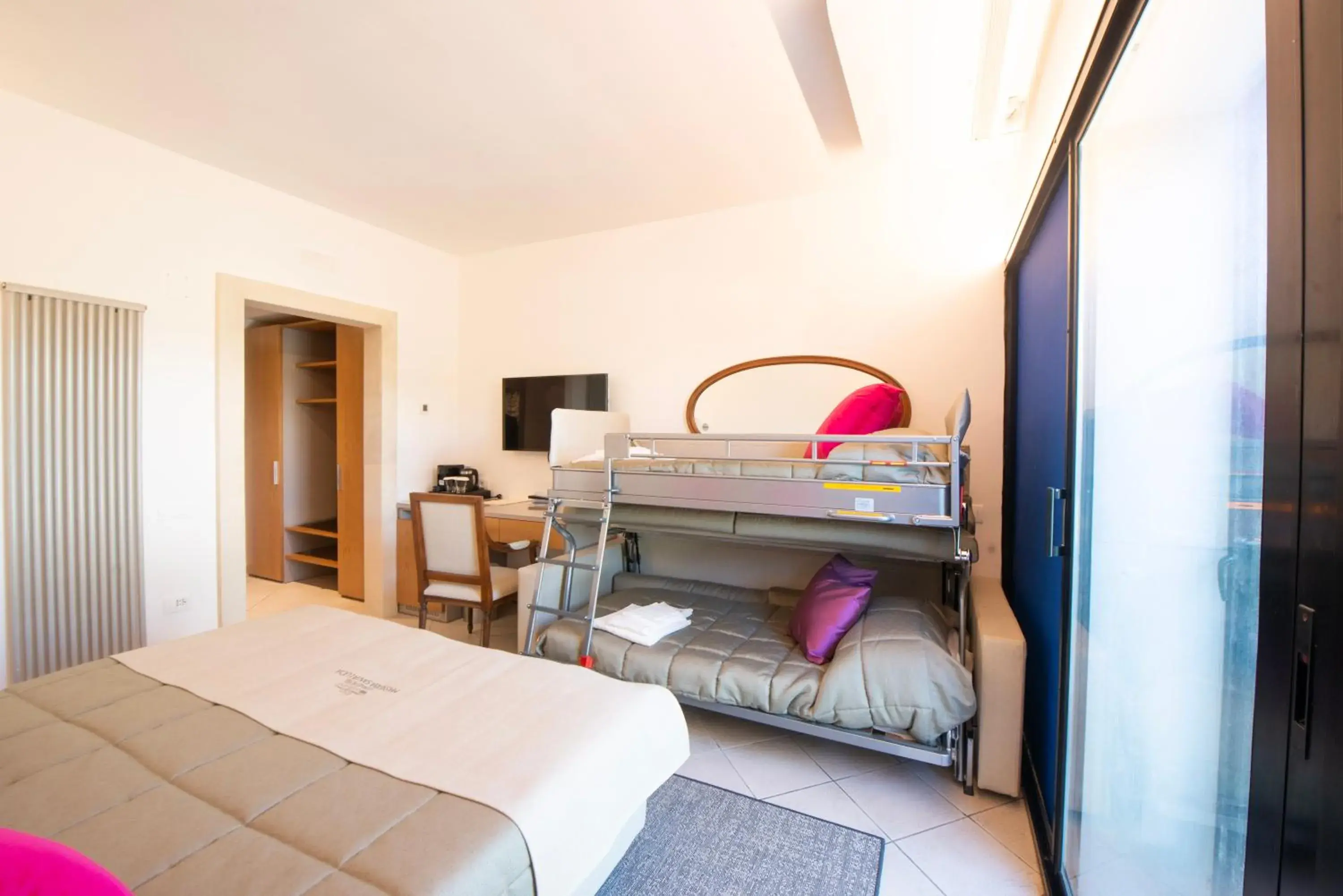 Superior Quadruple Room in Grand Hotel Masseria Santa Lucia Superior Quadruple Room in Grand Hotel Masseria Santa Lucia