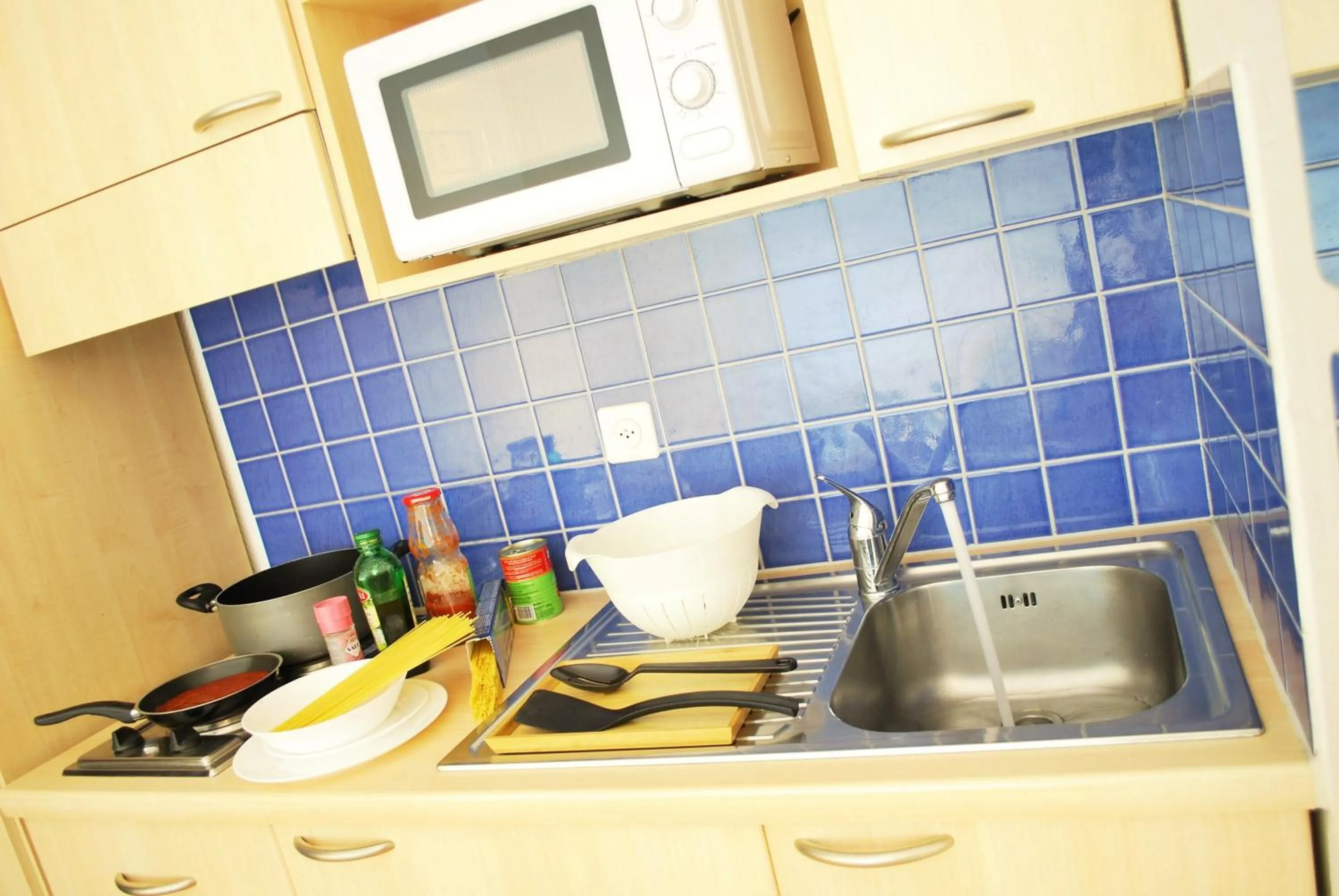 Kitchen or kitchenette in GuestHouse Lugano Center by LR