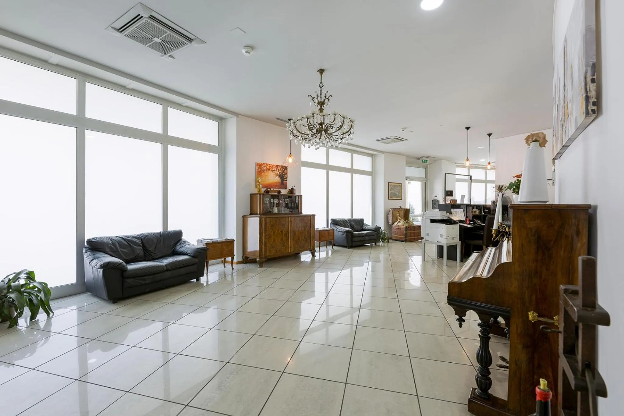 Lobby or reception in GuestHouse Lugano Center by LR