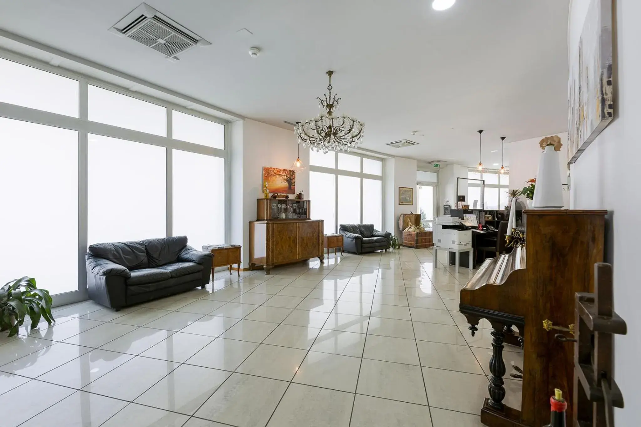 Lobby or reception in GuestHouse Lugano Center by LR Lobby or reception in GuestHouse Lugano Center by LR