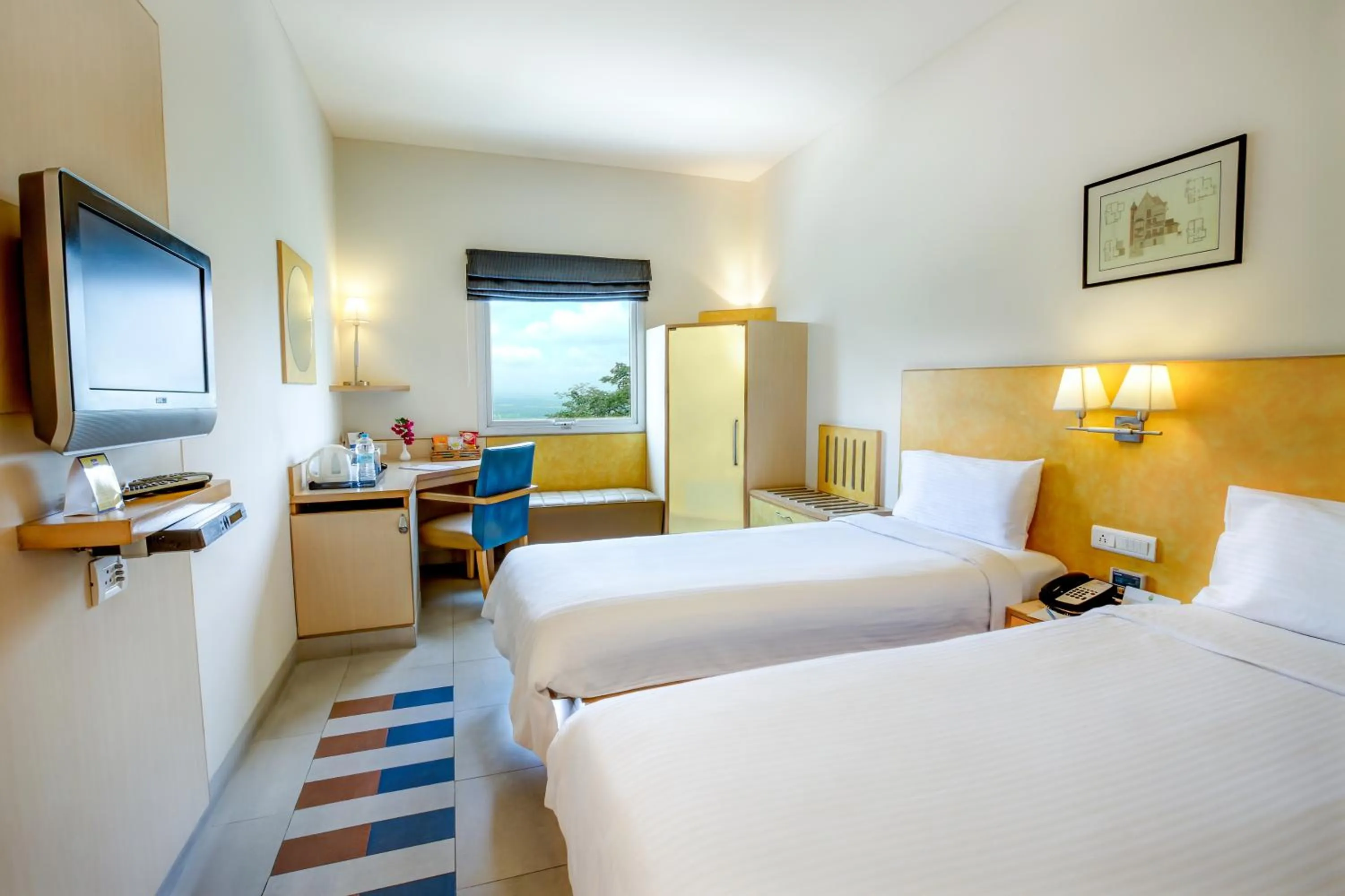 Photo of the whole room, Bed in Radha Hometel