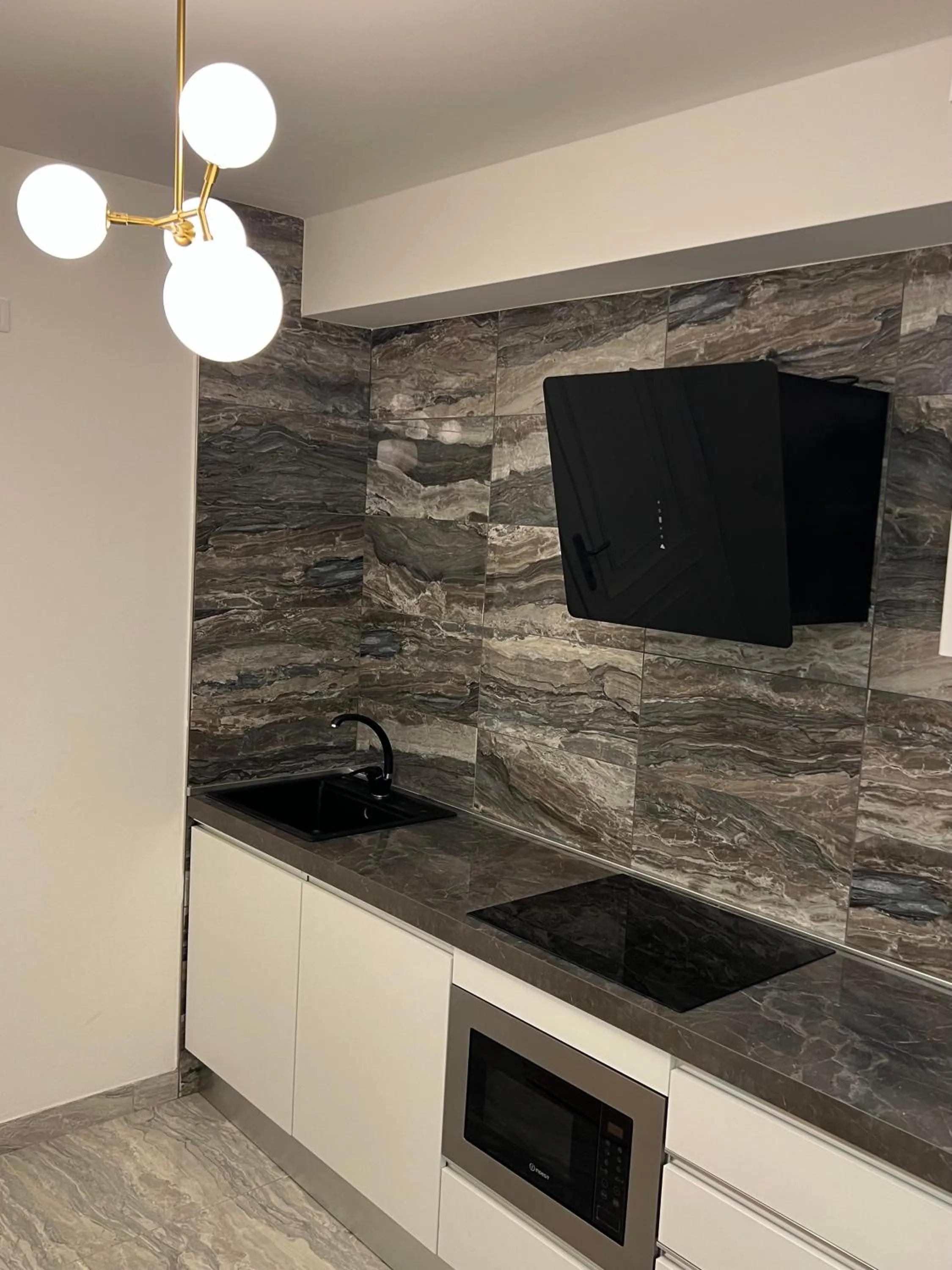 Kitchen or kitchenette in Loft Sirmione