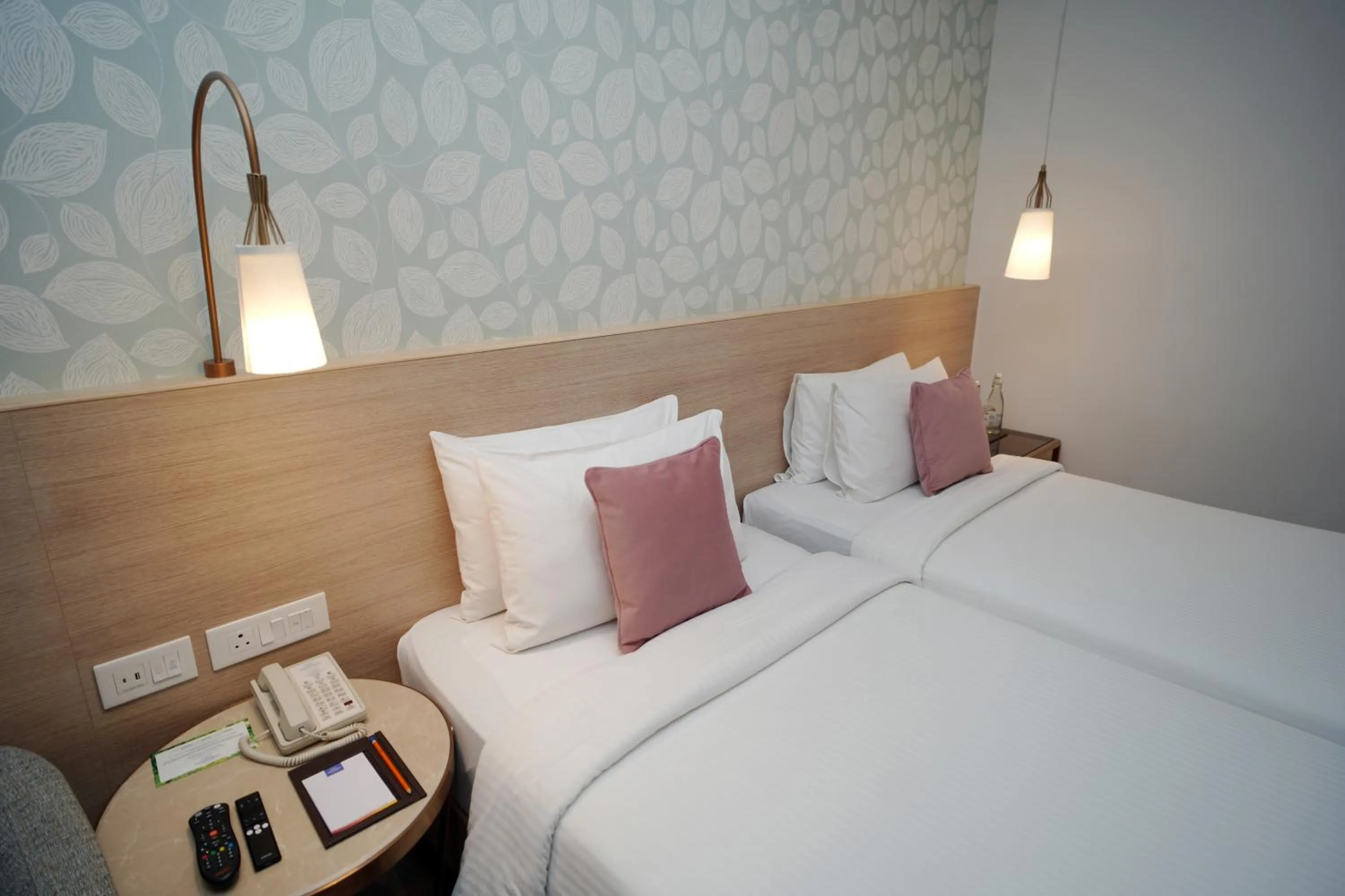 Bed in Muse Sarovar Portico Nehru Place