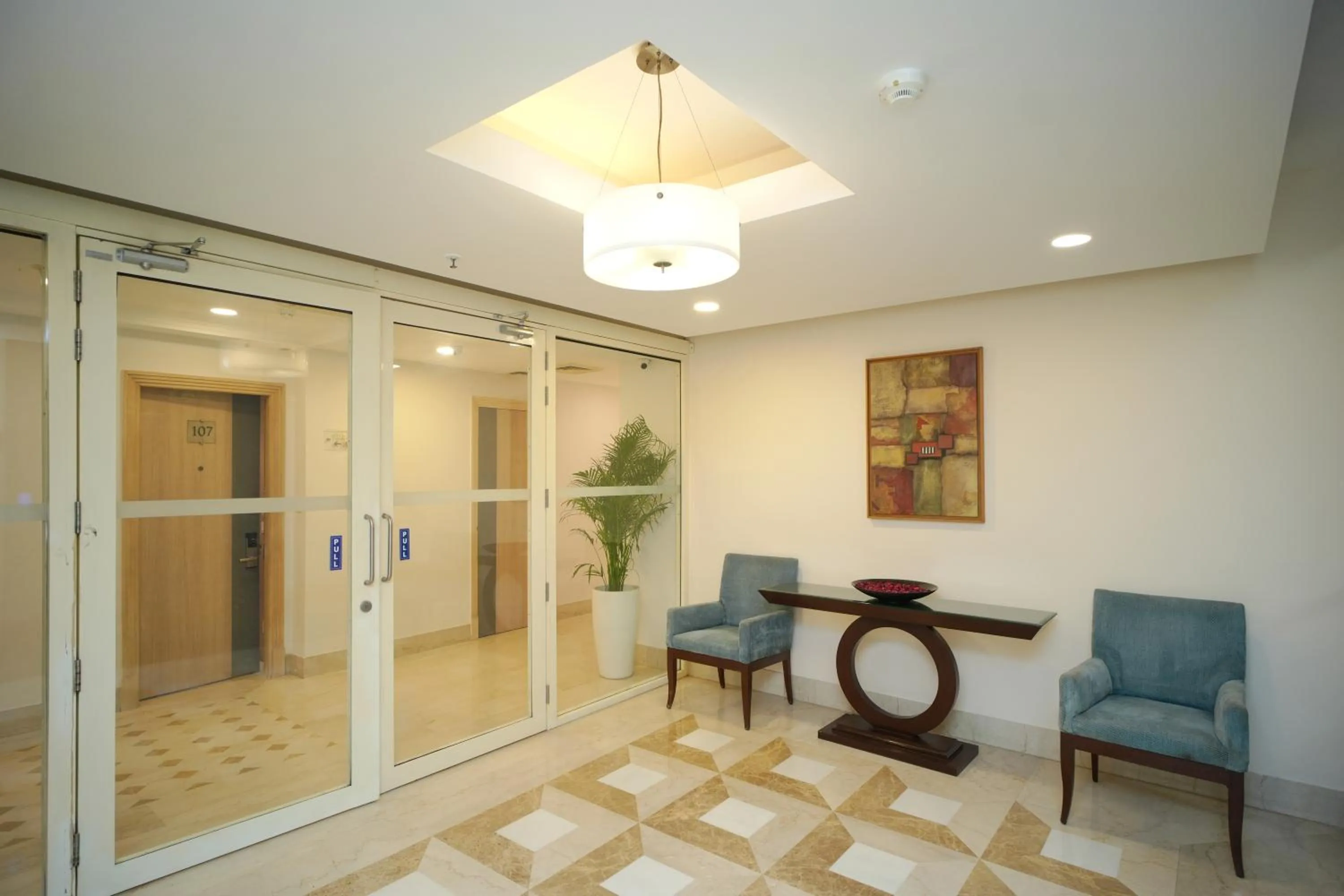 Seating area in Muse Sarovar Portico Nehru Place