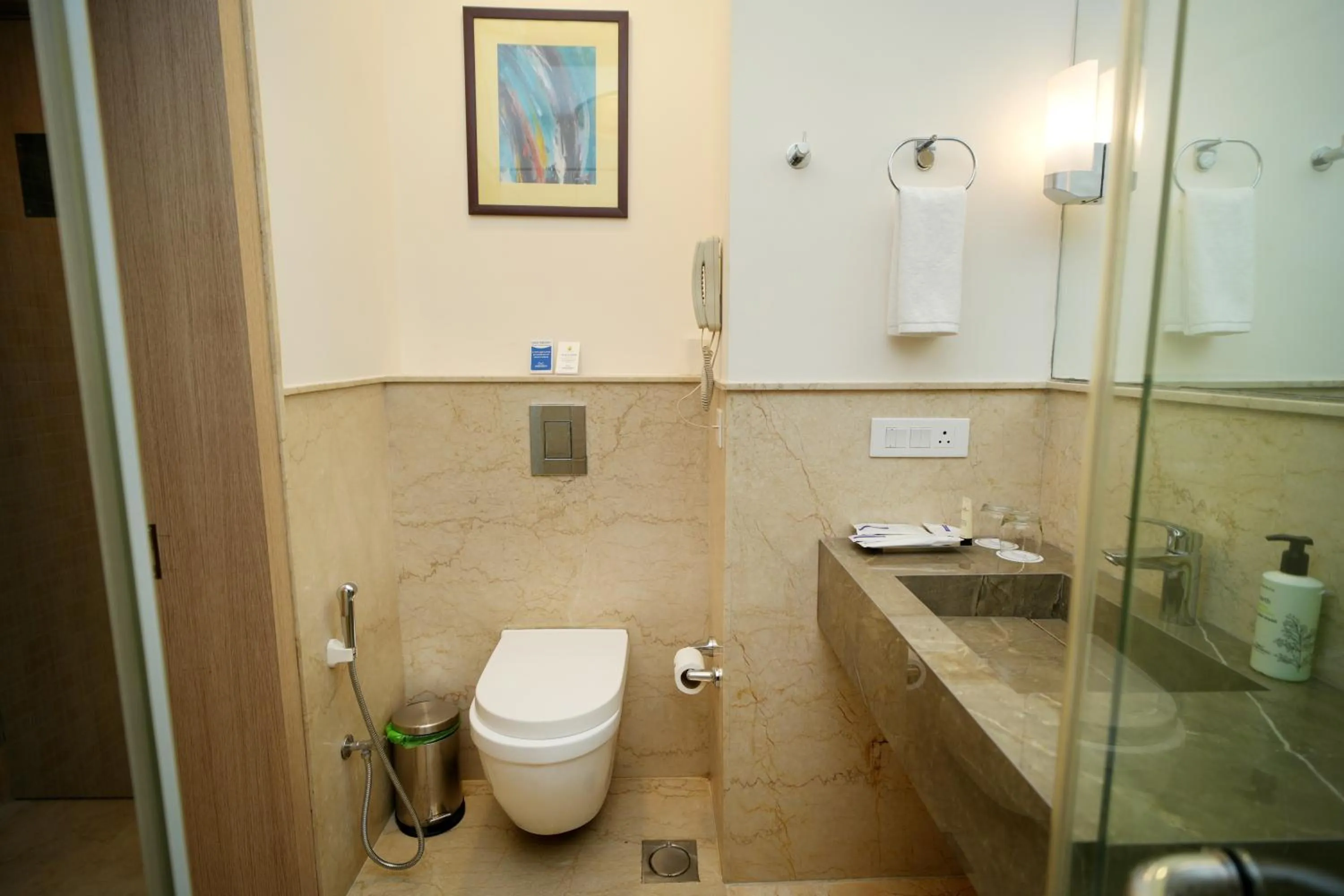 Bathroom in Muse Sarovar Portico Nehru Place