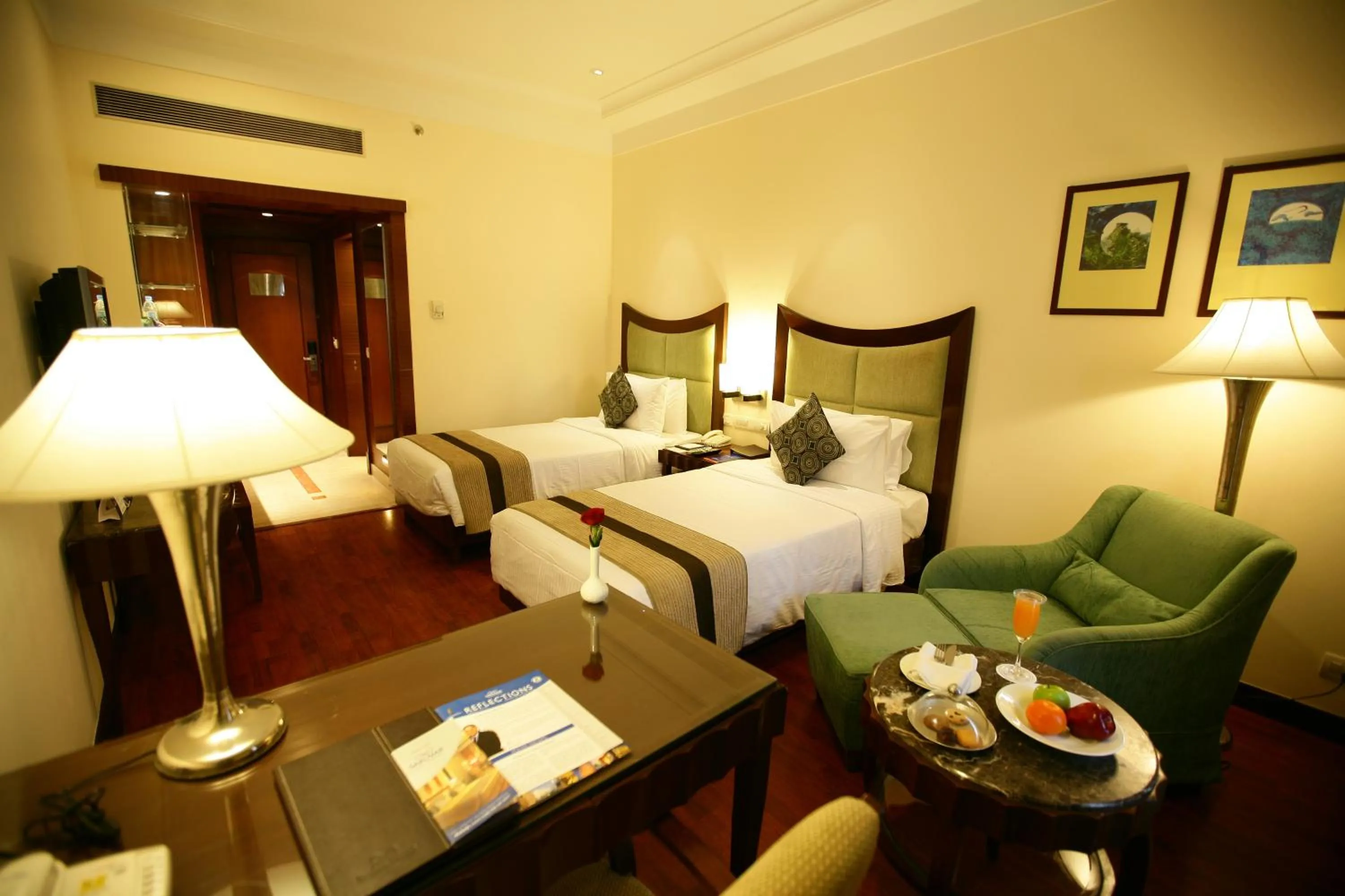 Bedroom, Bed in Muse Sarovar Portico Nehru Place