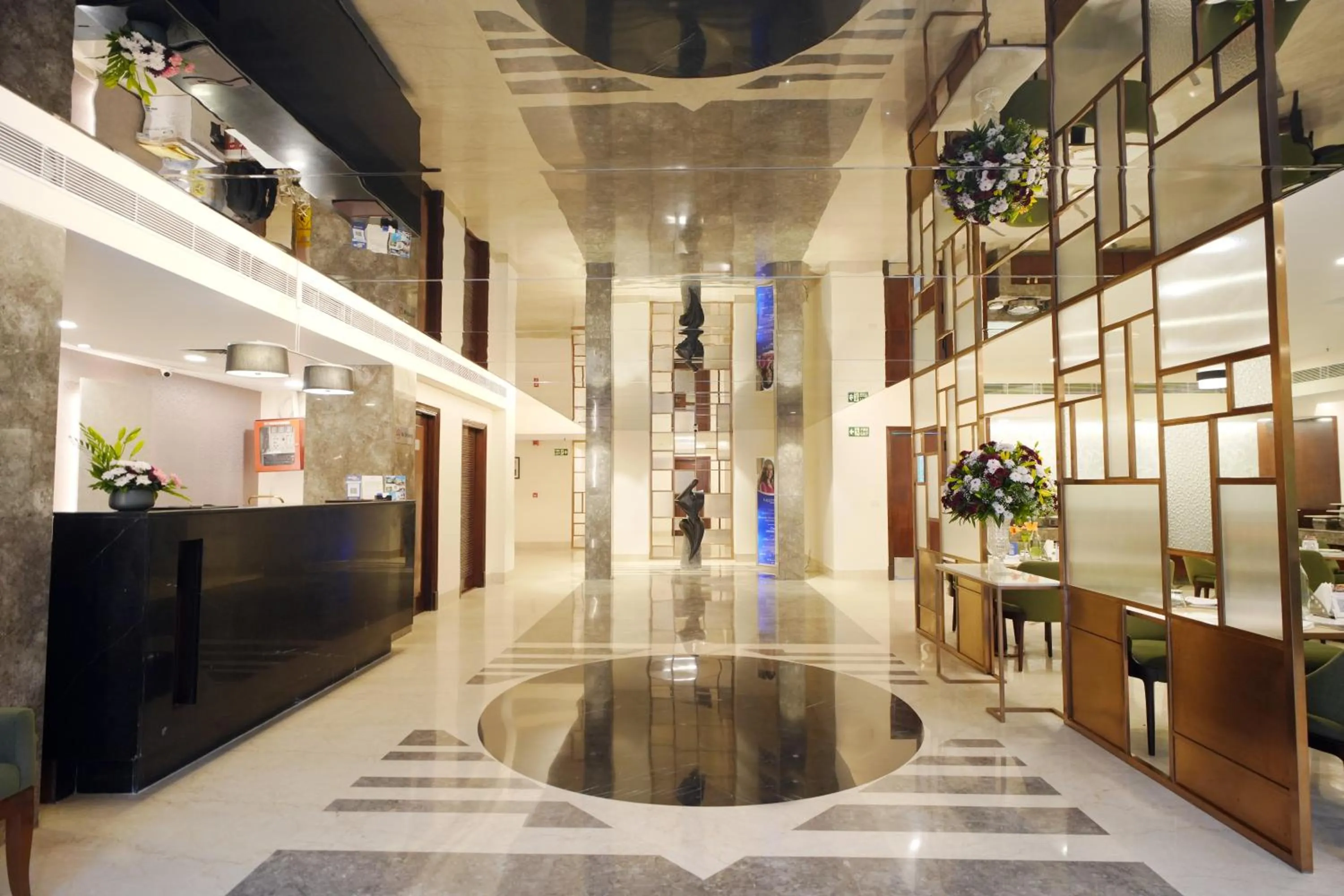 Lobby or reception in Muse Sarovar Portico Nehru Place