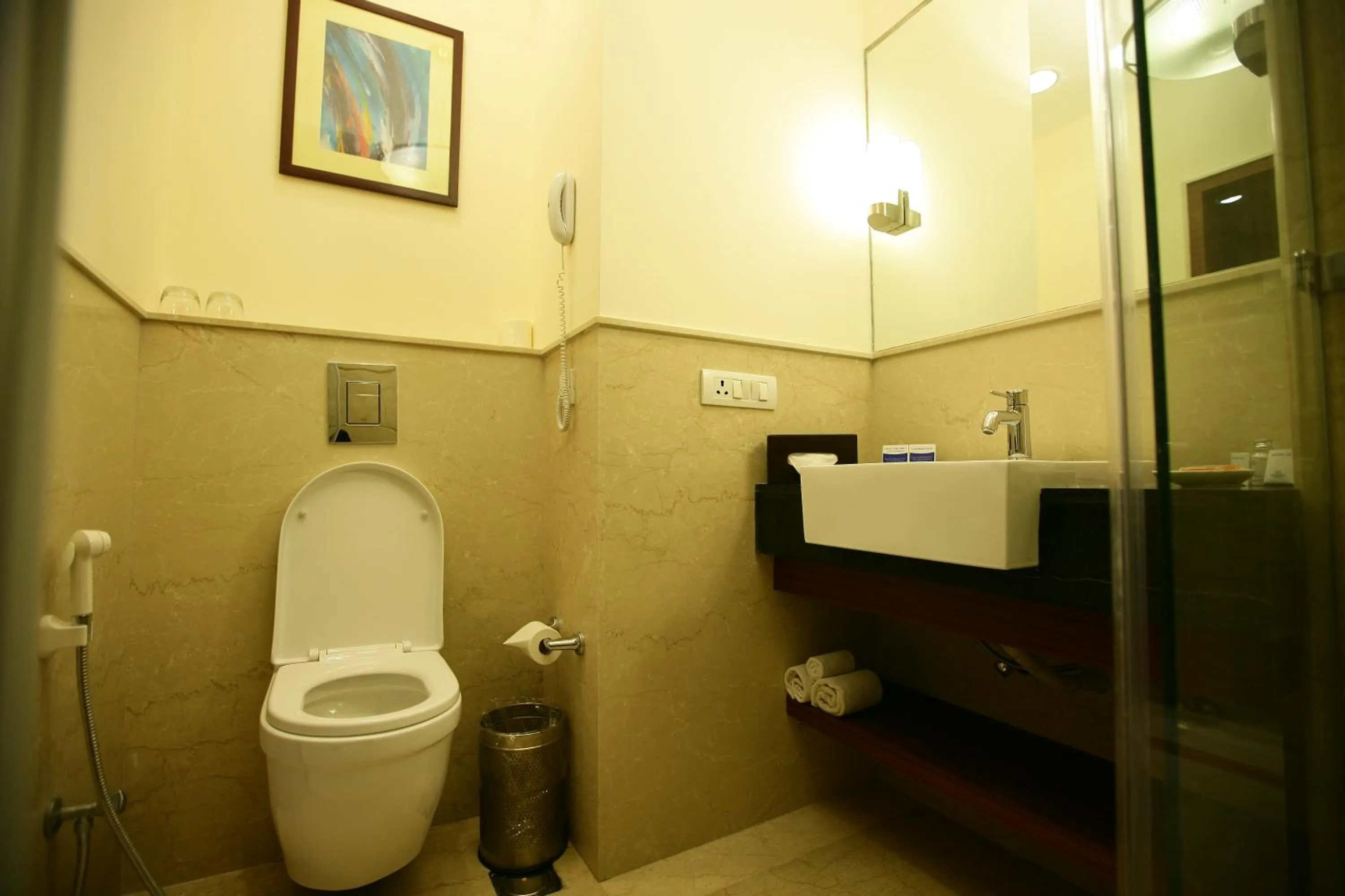 Bathroom in Muse Sarovar Portico Nehru Place
