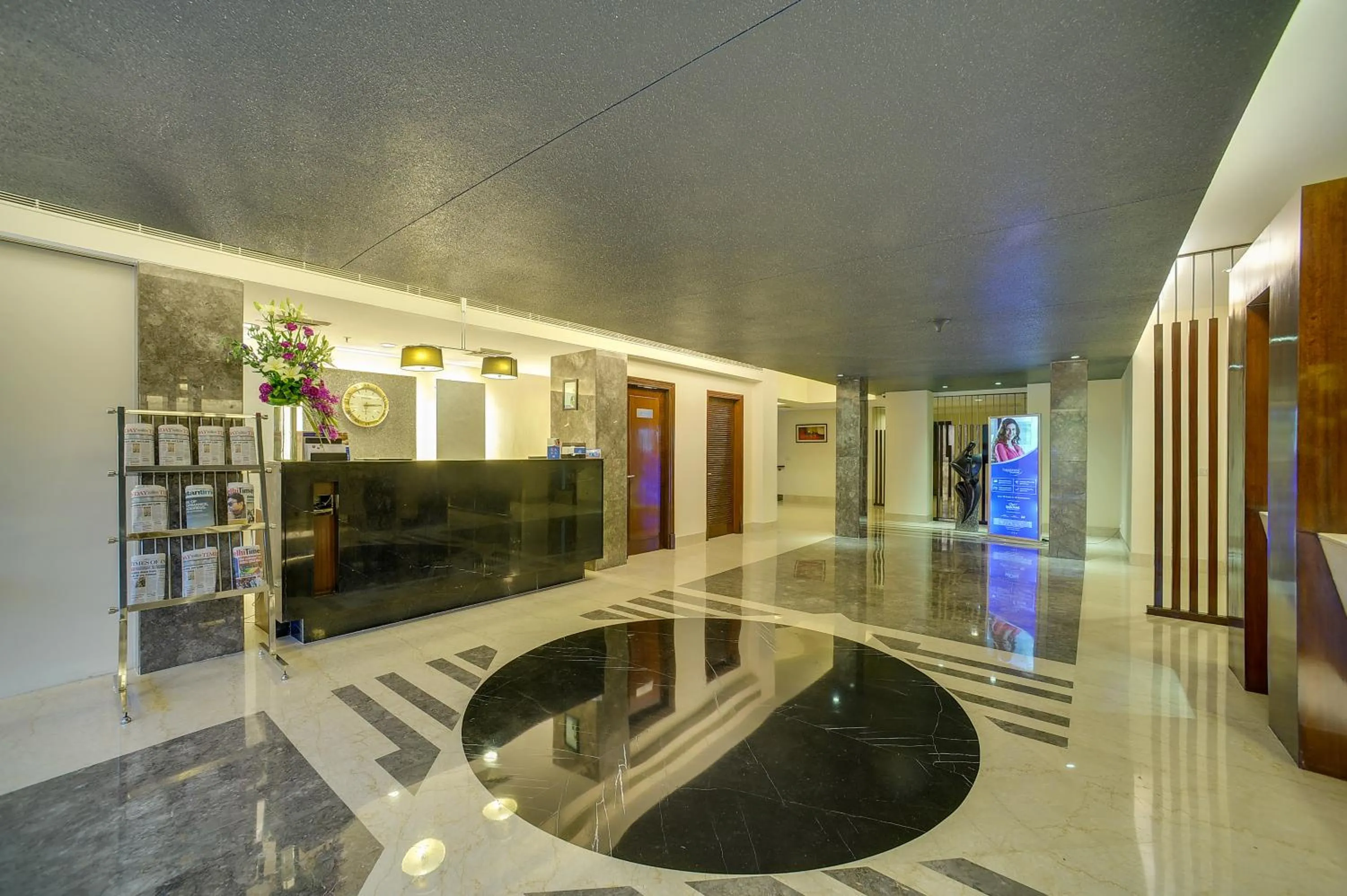 Lobby or reception in Muse Sarovar Portico Nehru Place