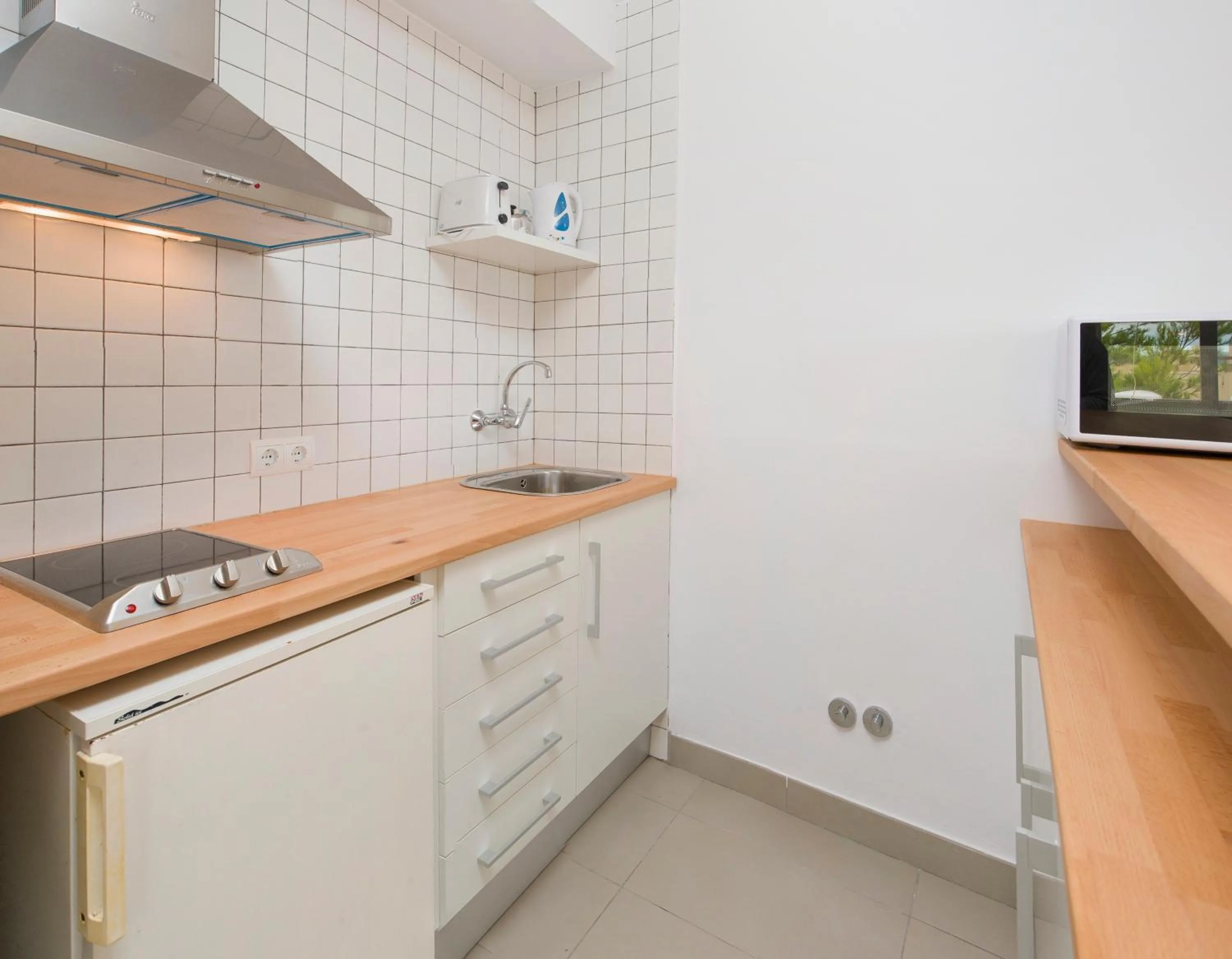 Kitchen or kitchenette in Apartamentos Vibra Riviera