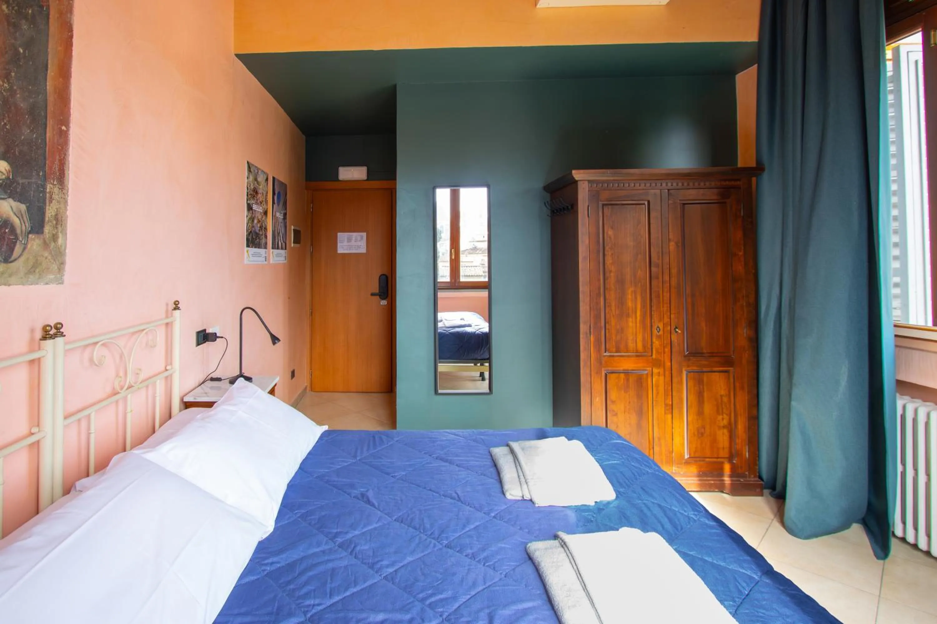 Bed in Hotel Merlini