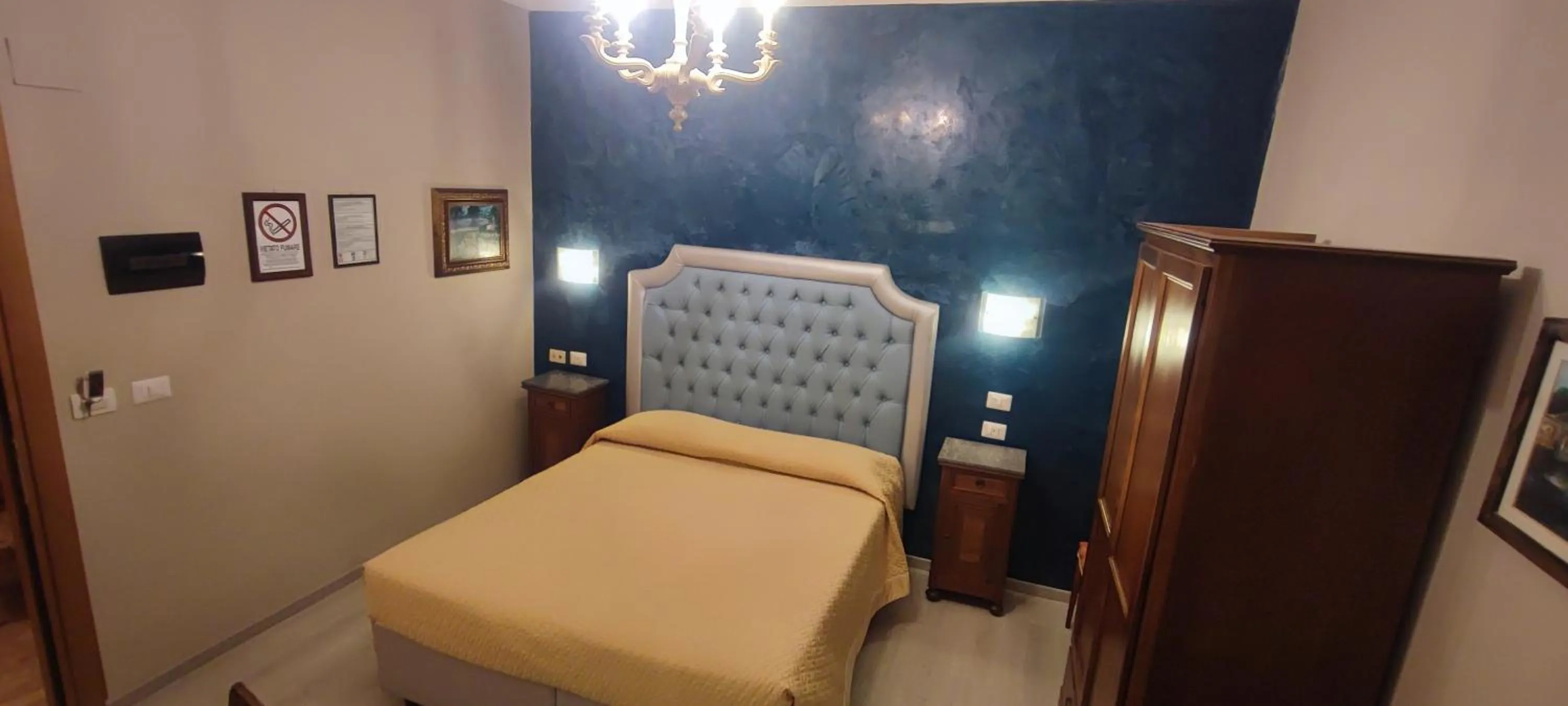 Bed in Hotel Merlini