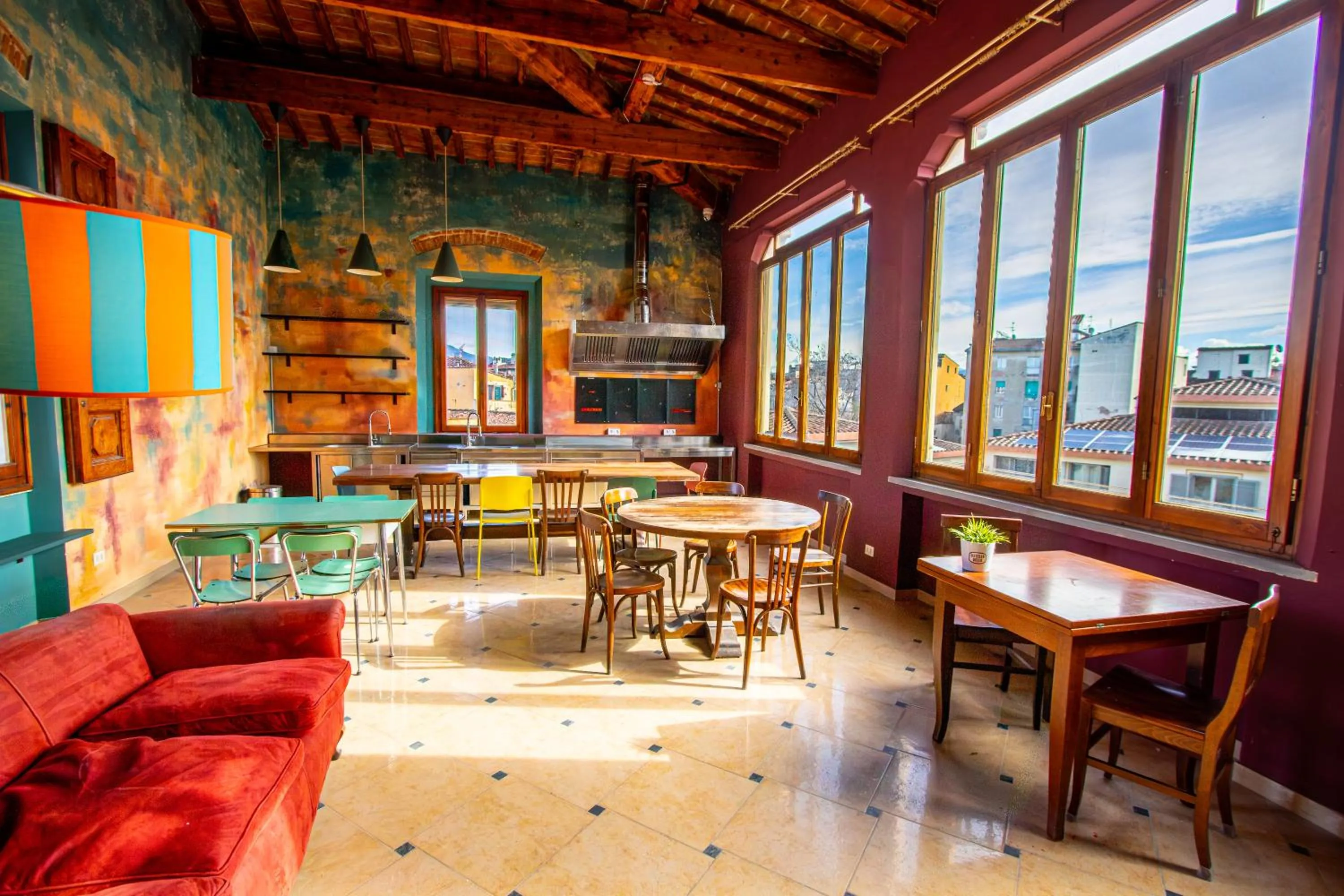 Communal lounge/ TV room in Hotel Merlini