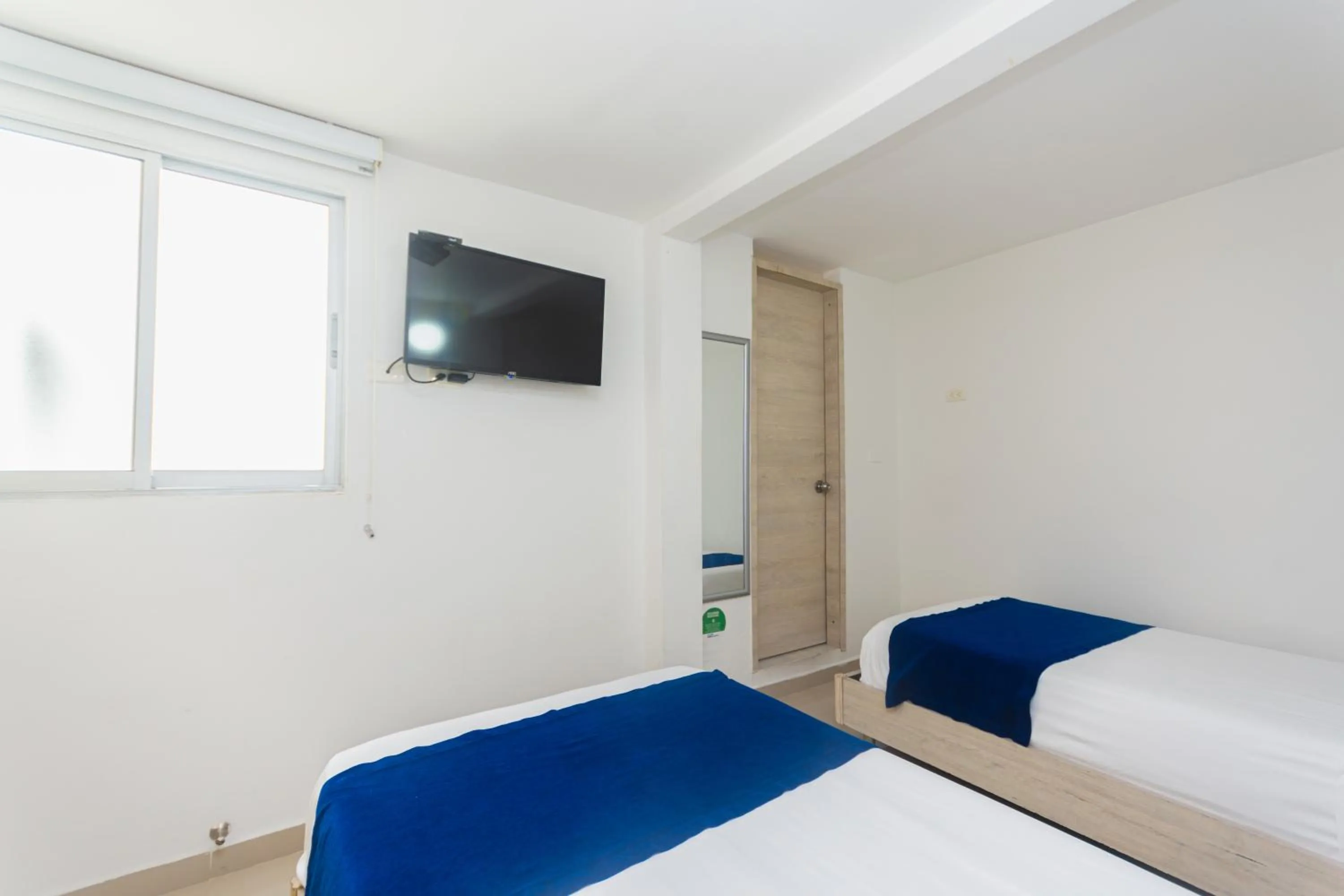 Bed in Hotel Suite del Parque