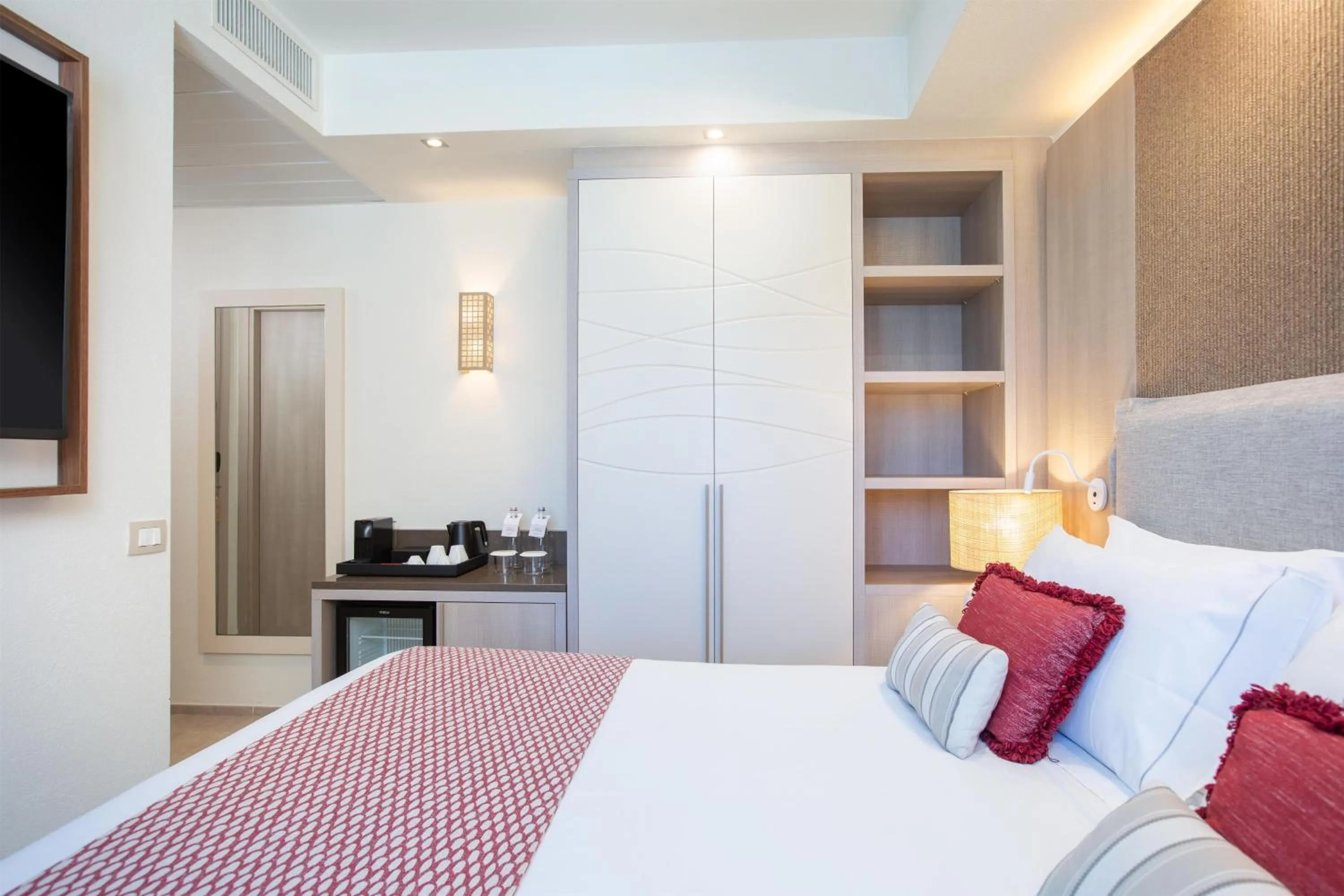 Bed in Mangia's Santa Teresa Sardinia, Curio Collection by Hilton