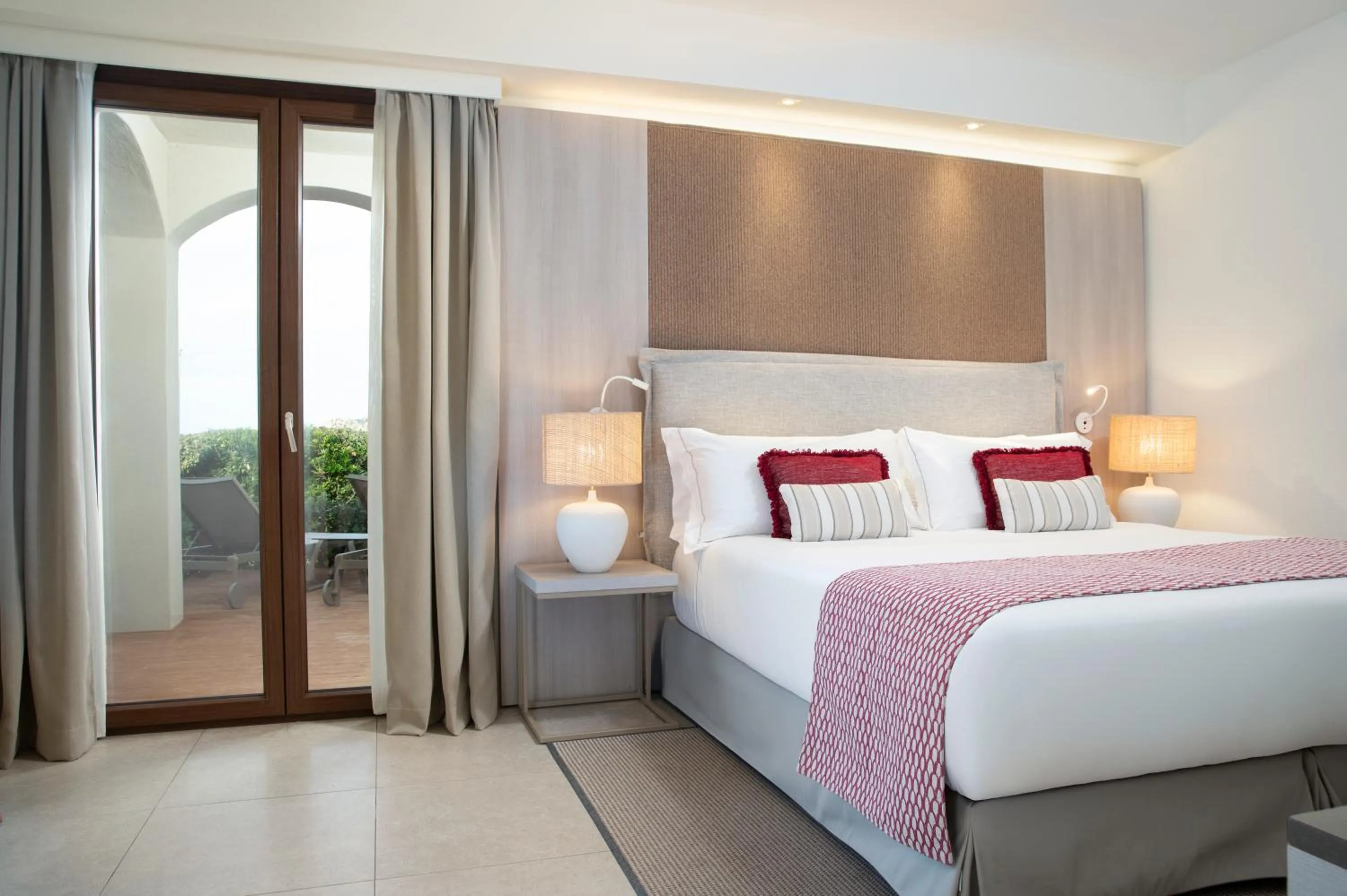 Bed in Mangia's Santa Teresa Sardinia, Curio Collection by Hilton