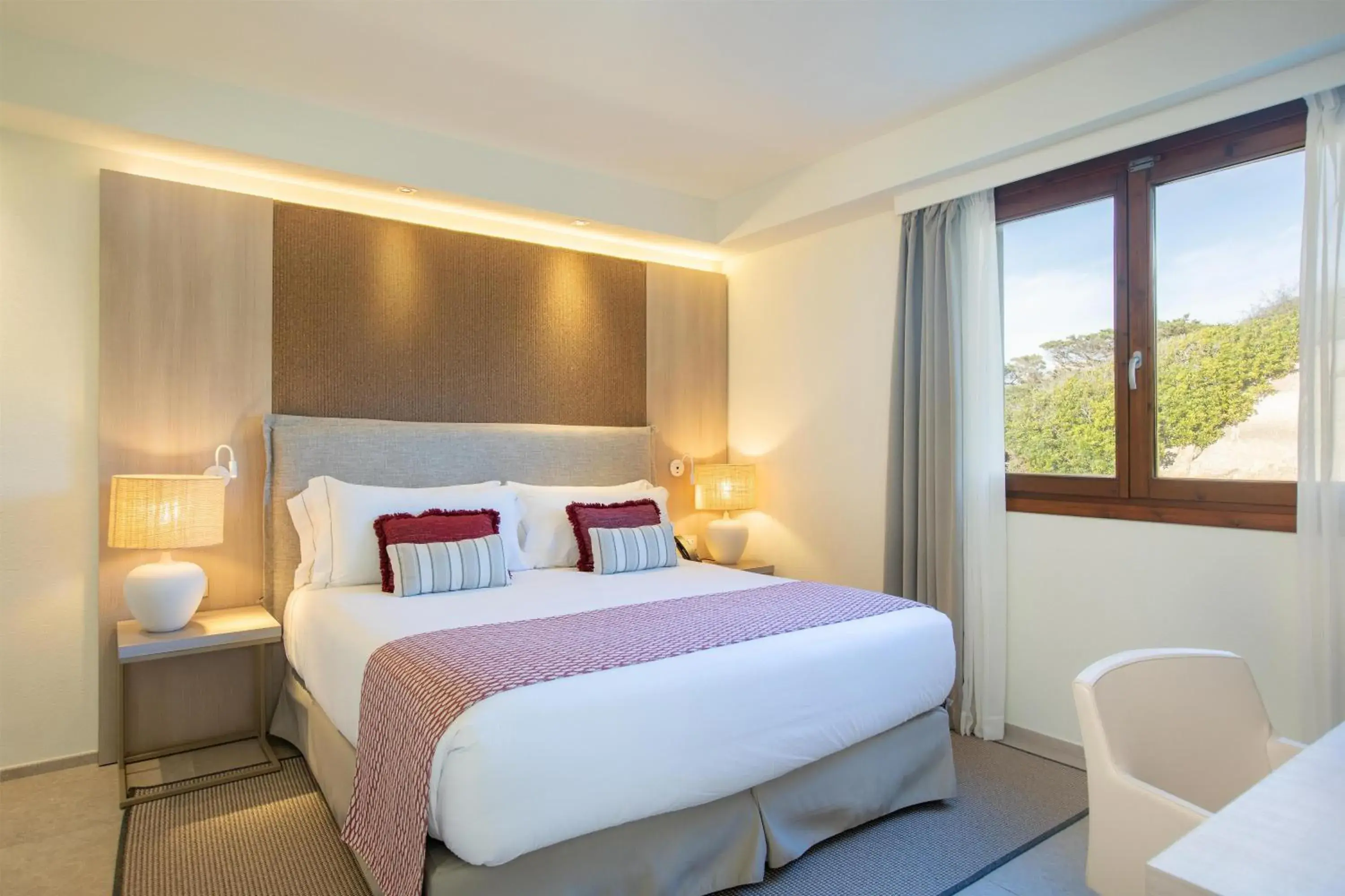 Deluxe King Room in Mangia's Santa Teresa Sardinia, Curio Collection by Hilton Deluxe King Room in Mangia's Santa Teresa Sardinia, Curio Collection by Hilton