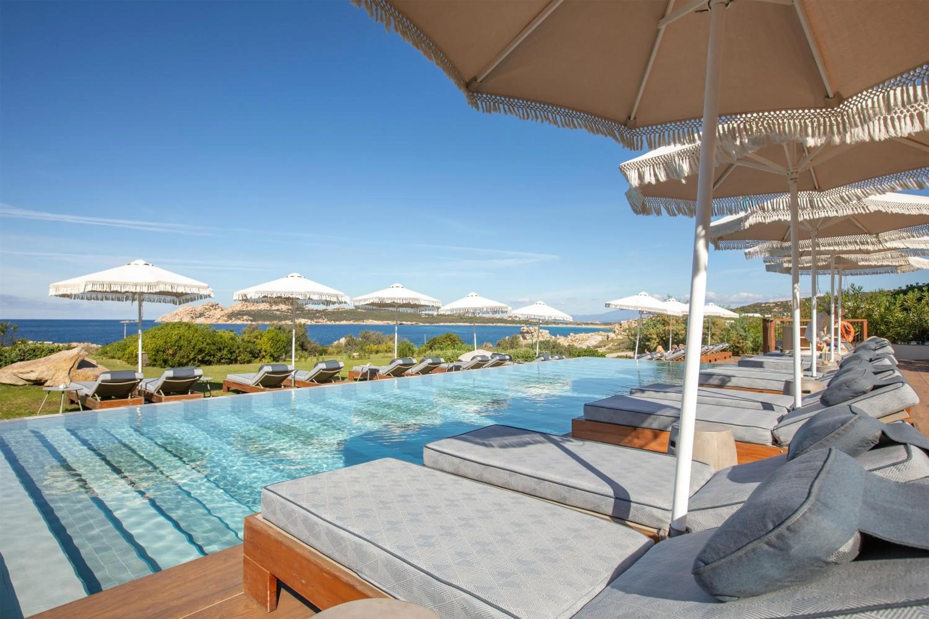 Pool view in Mangia's Santa Teresa Sardinia, Curio Collection by Hilton