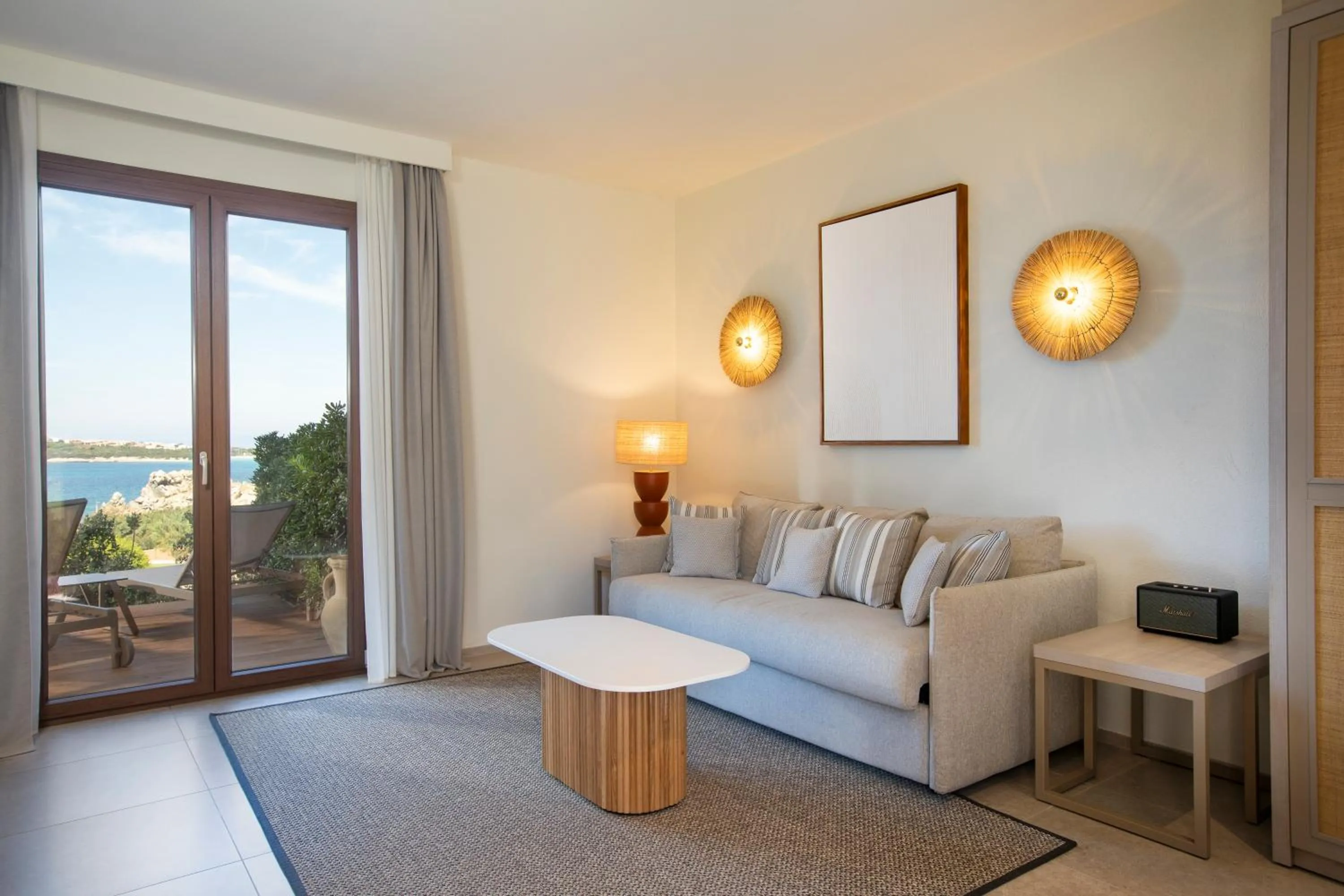 Photo of the whole room in Mangia's Santa Teresa Sardinia, Curio Collection by Hilton