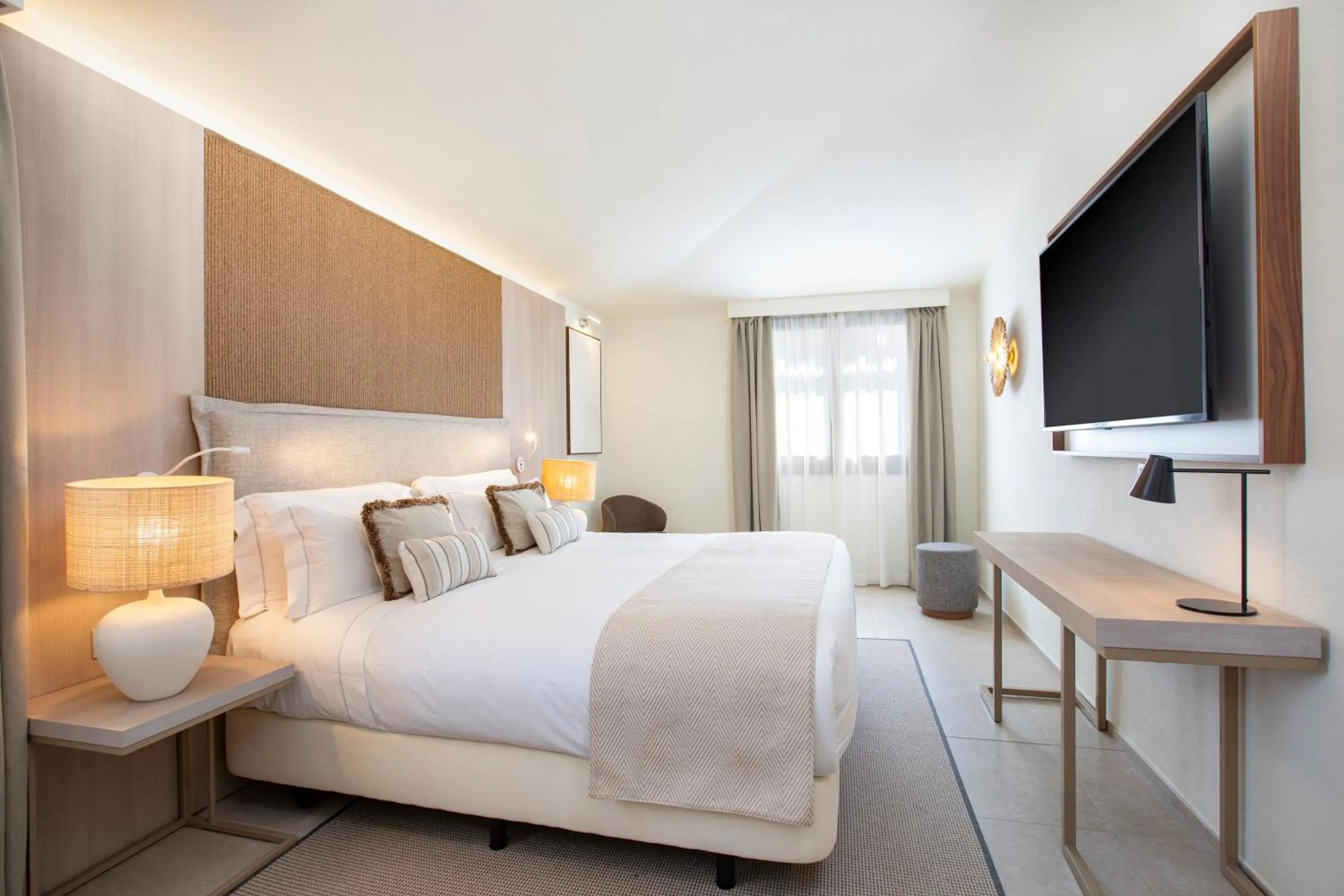 Bed in Mangia's Santa Teresa Sardinia, Curio Collection by Hilton