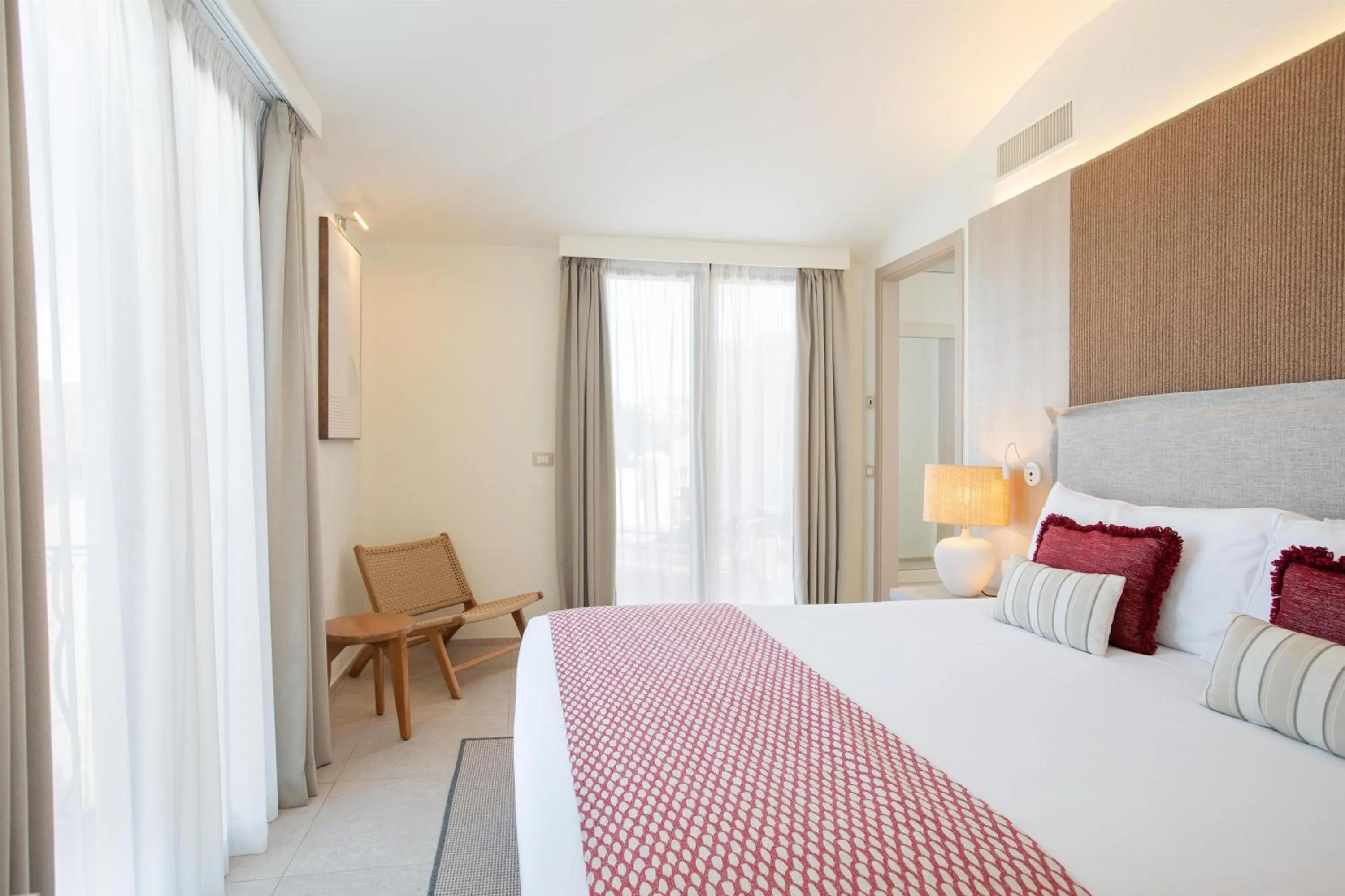 Bed in Mangia's Santa Teresa Sardinia, Curio Collection by Hilton