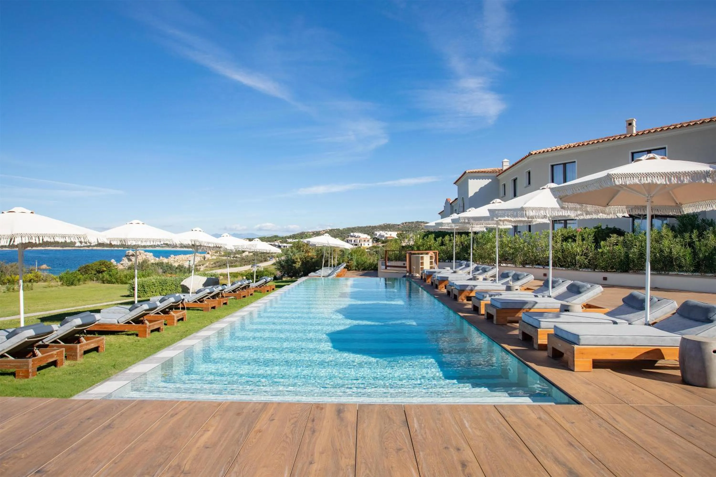 Pool view in Mangia's Santa Teresa Sardinia, Curio Collection by Hilton