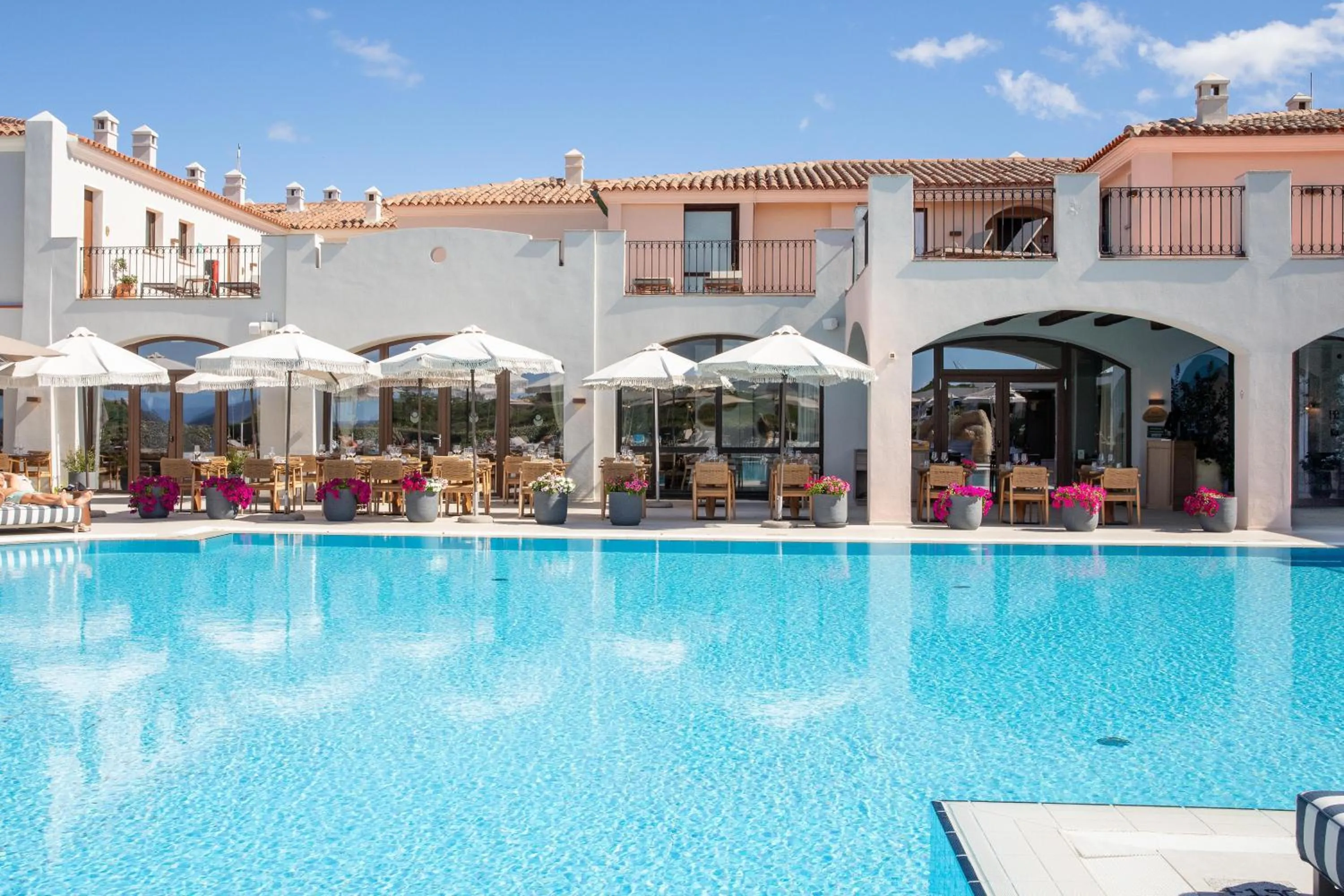 Pool view in Mangia's Santa Teresa Sardinia, Curio Collection by Hilton