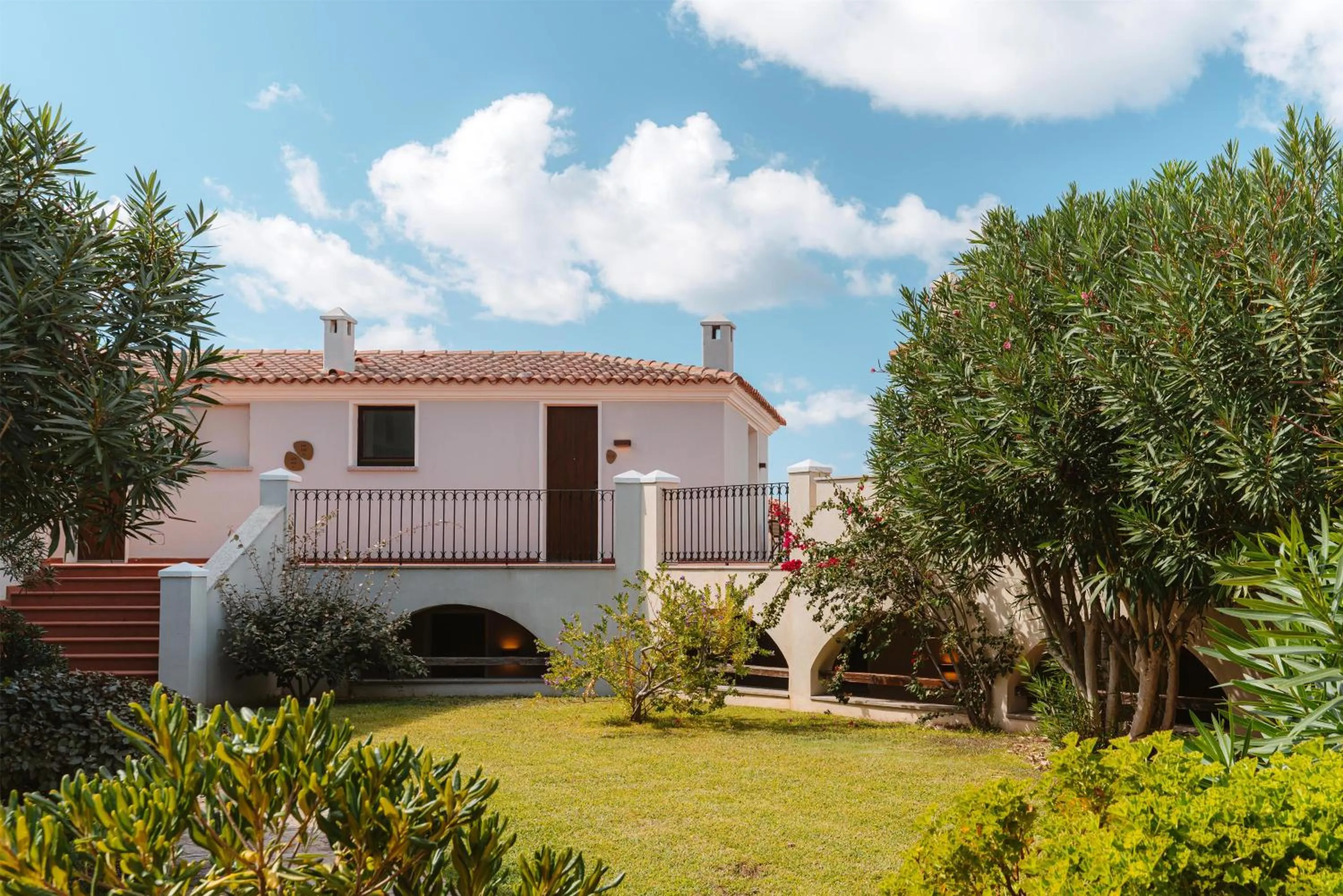 Property building in Mangia's Santa Teresa Sardinia, Curio Collection by Hilton