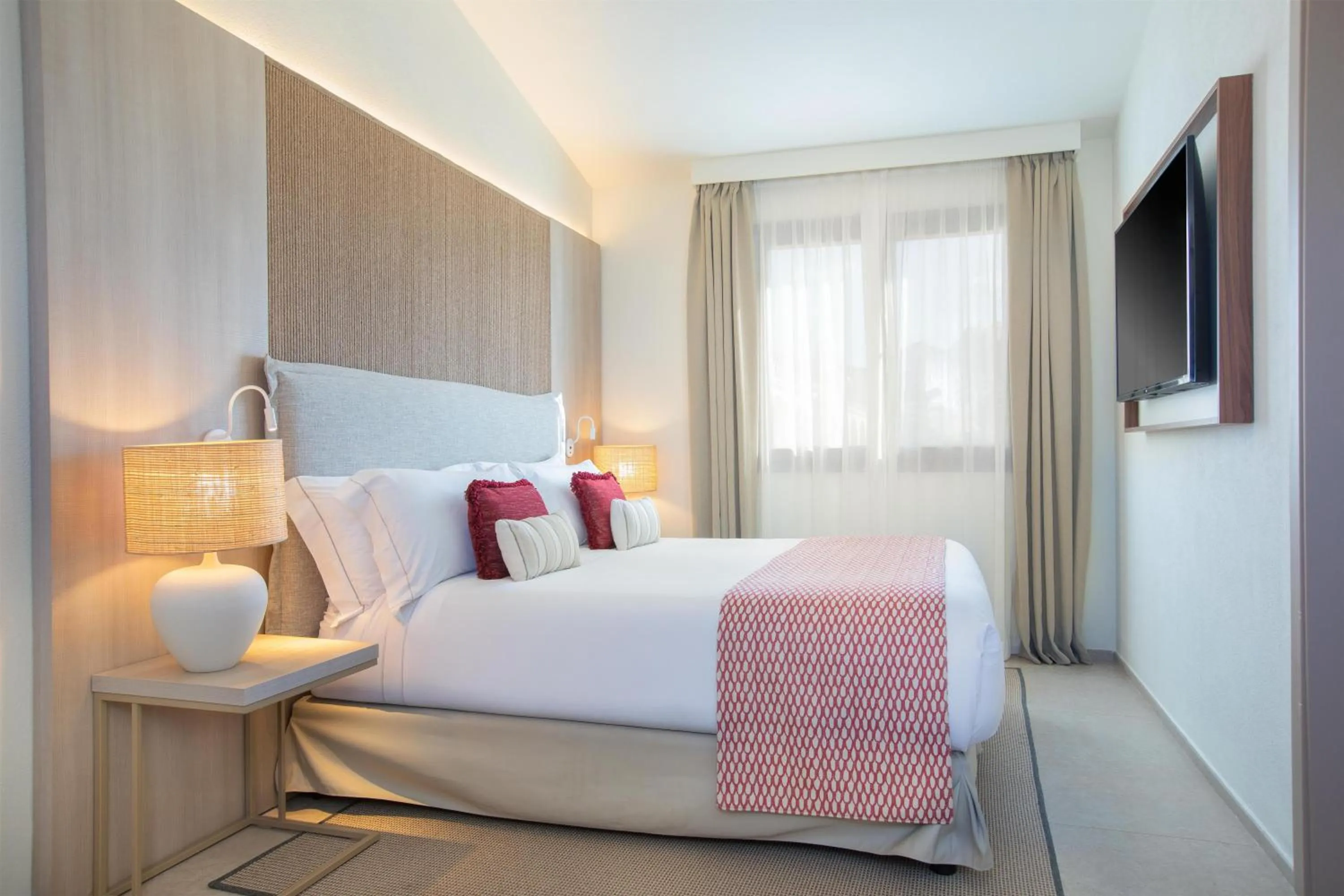 Bed in Mangia's Santa Teresa Sardinia, Curio Collection by Hilton