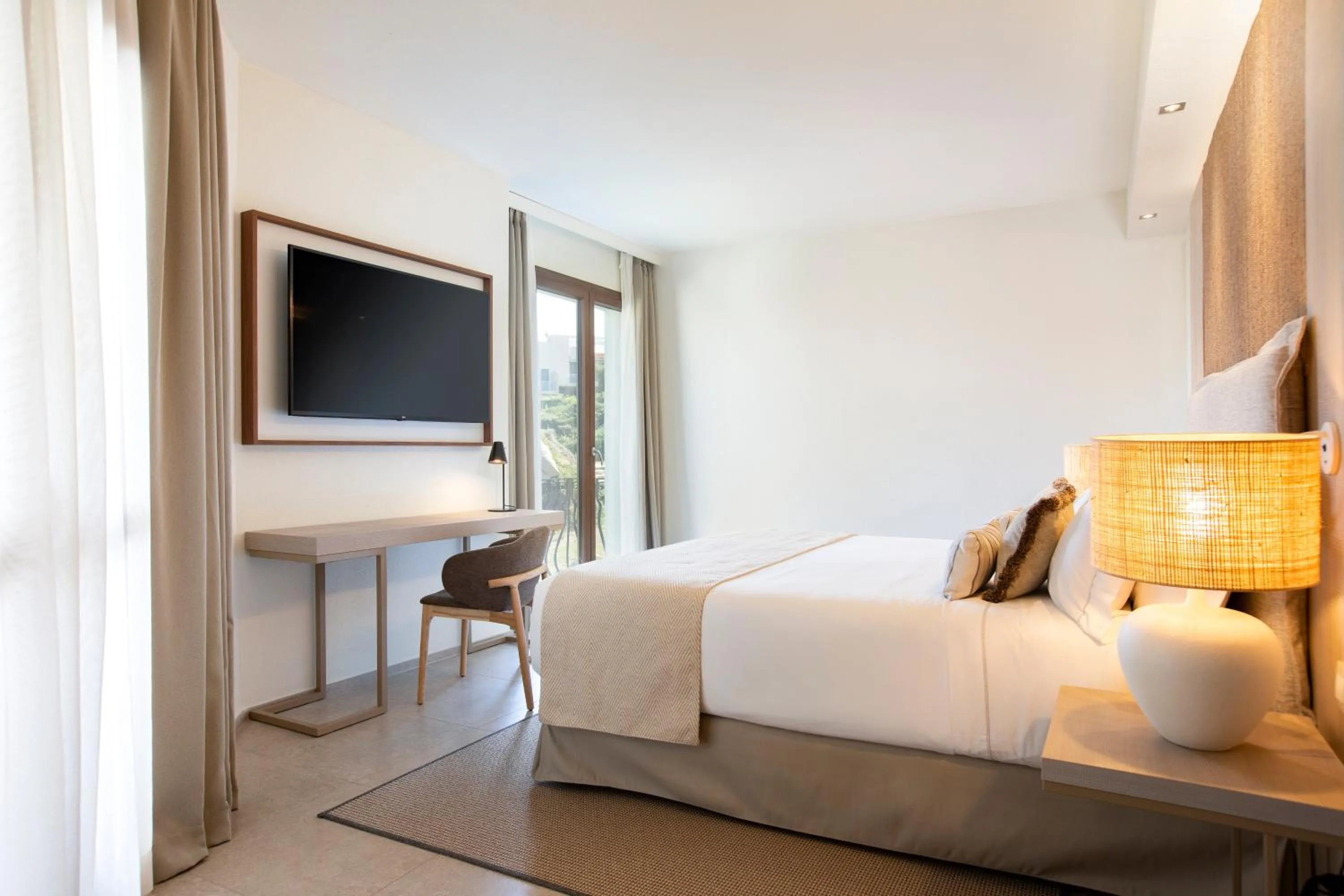 Bed in Mangia's Santa Teresa Sardinia, Curio Collection by Hilton