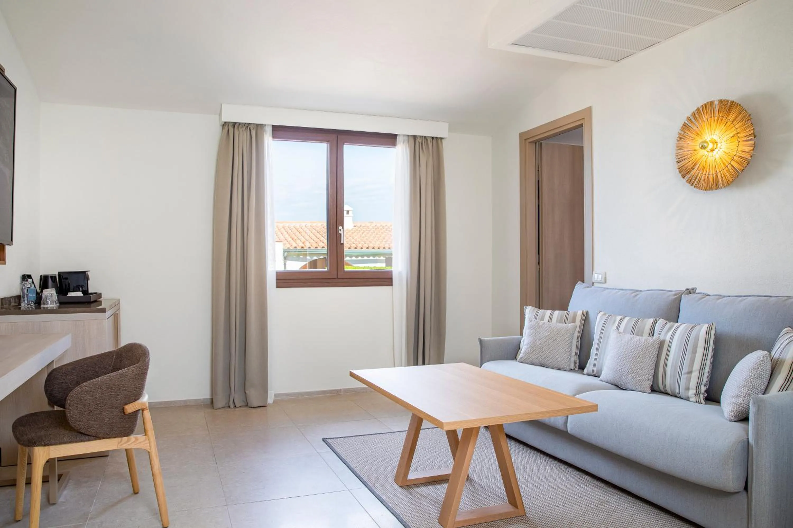 Photo of the whole room in Mangia's Santa Teresa Sardinia, Curio Collection by Hilton