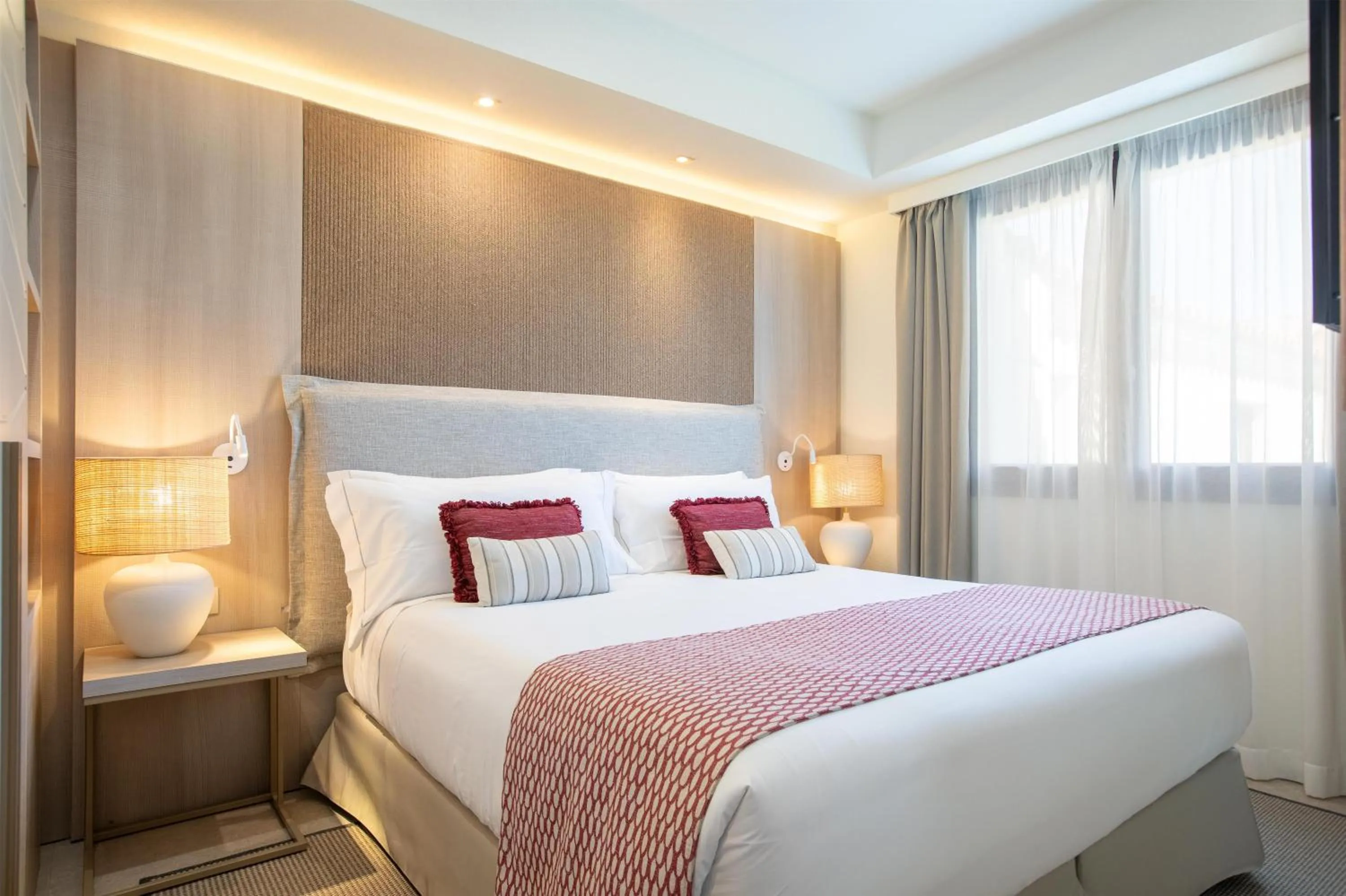 Bed in Mangia's Santa Teresa Sardinia, Curio Collection by Hilton