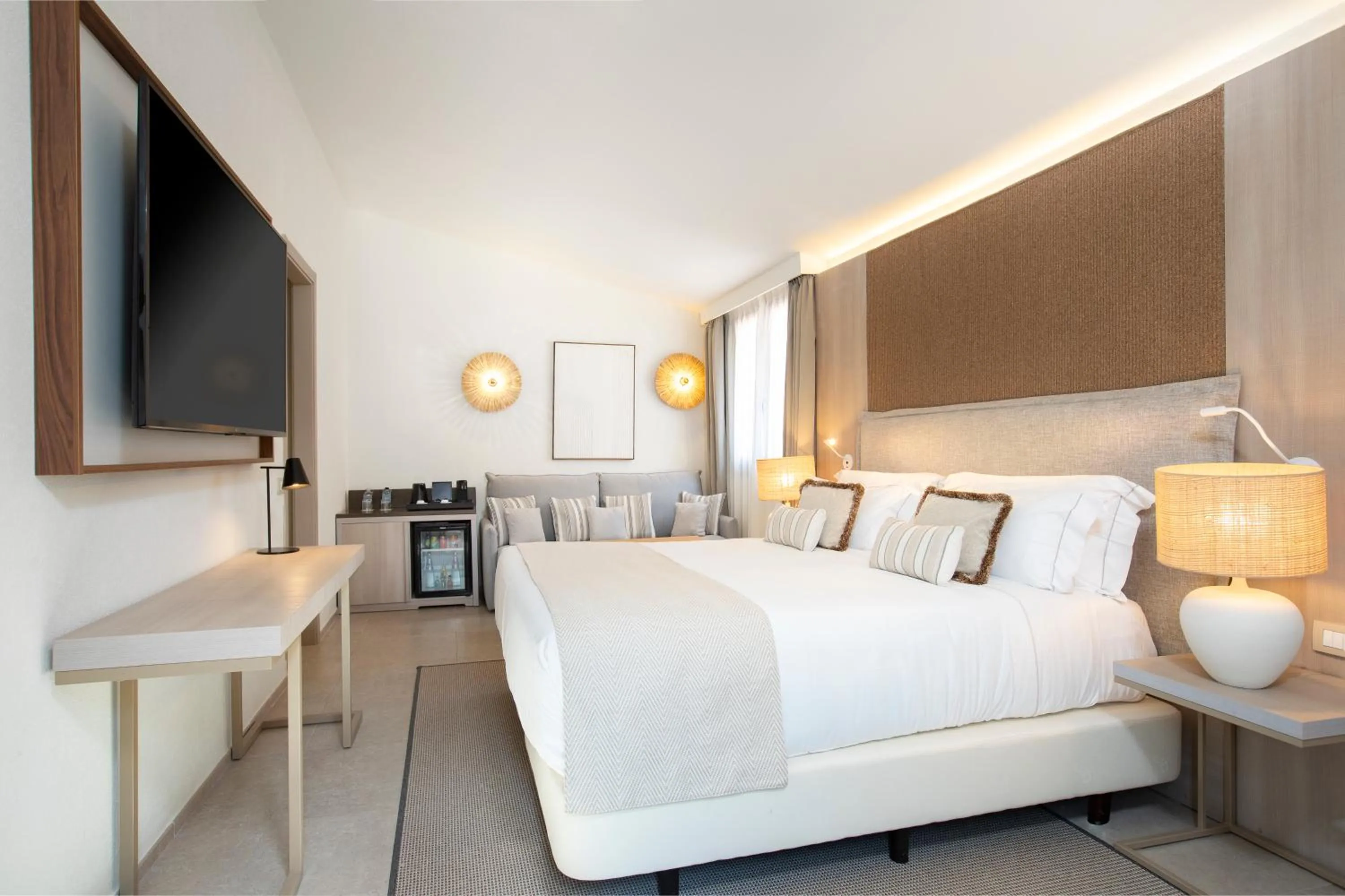 Photo of the whole room, Bed in Mangia's Santa Teresa Sardinia, Curio Collection by Hilton