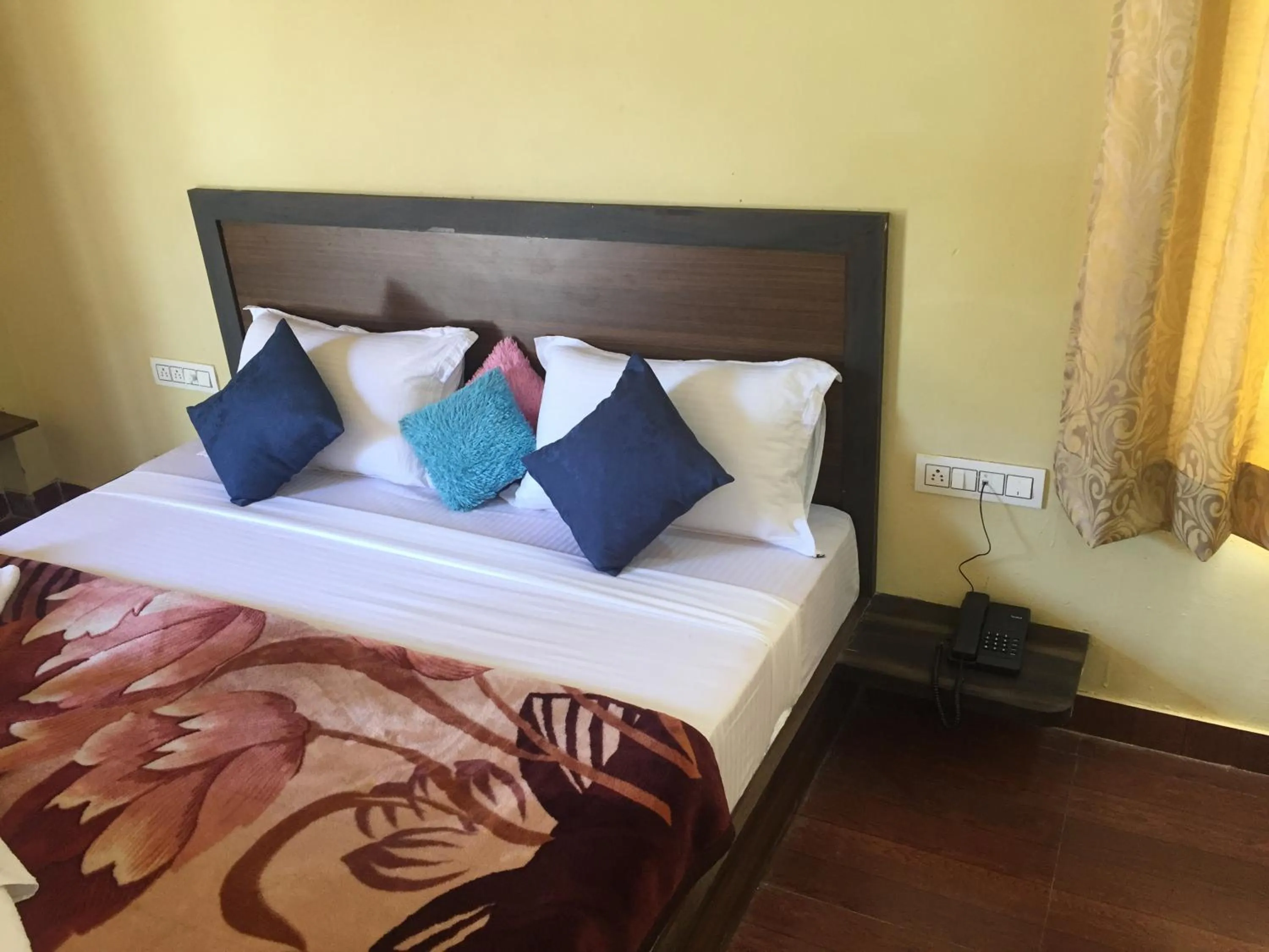 Bed in Chitrakoot Garden and Resorts