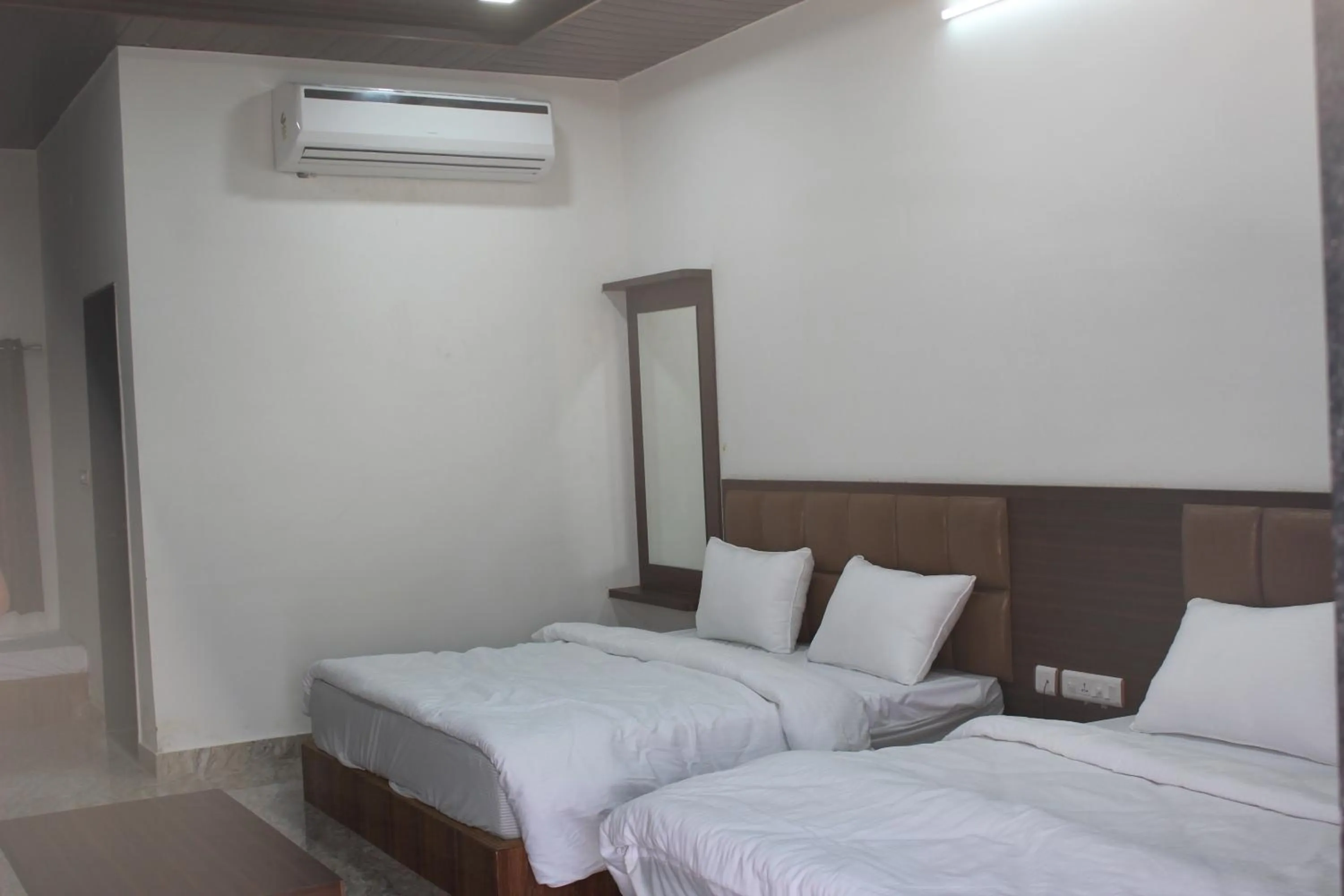 Bedroom in Chitrakoot Garden and Resorts