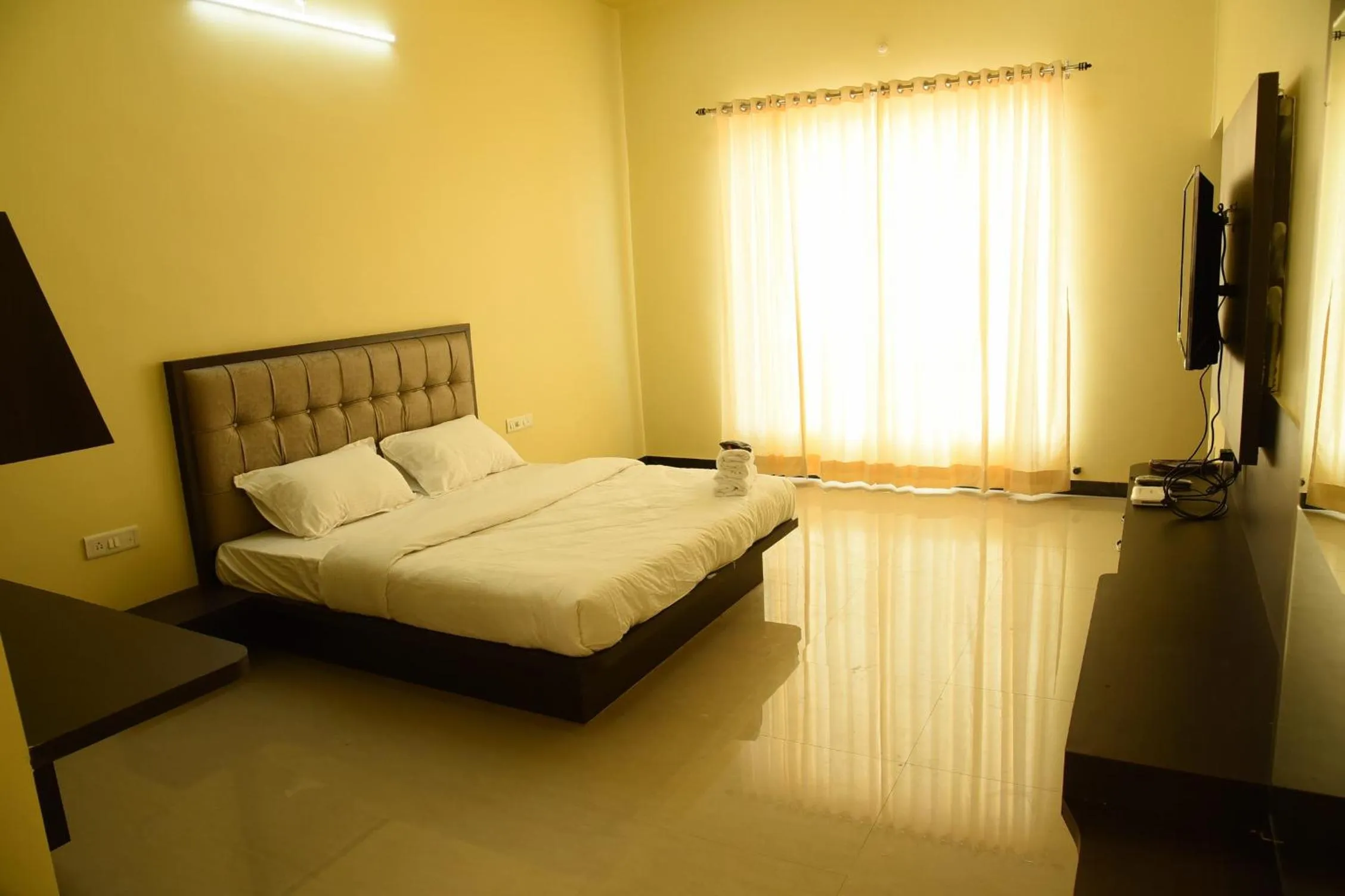 Bed in Chitrakoot Garden and Resorts