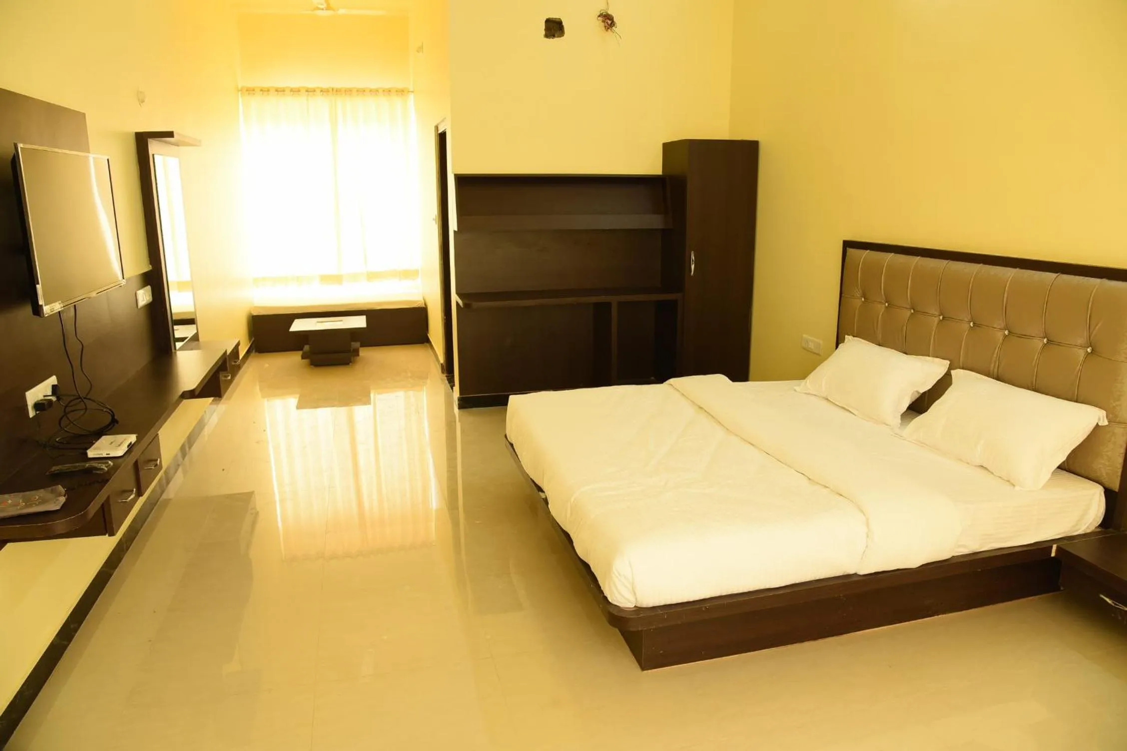 Bed in Chitrakoot Garden and Resorts