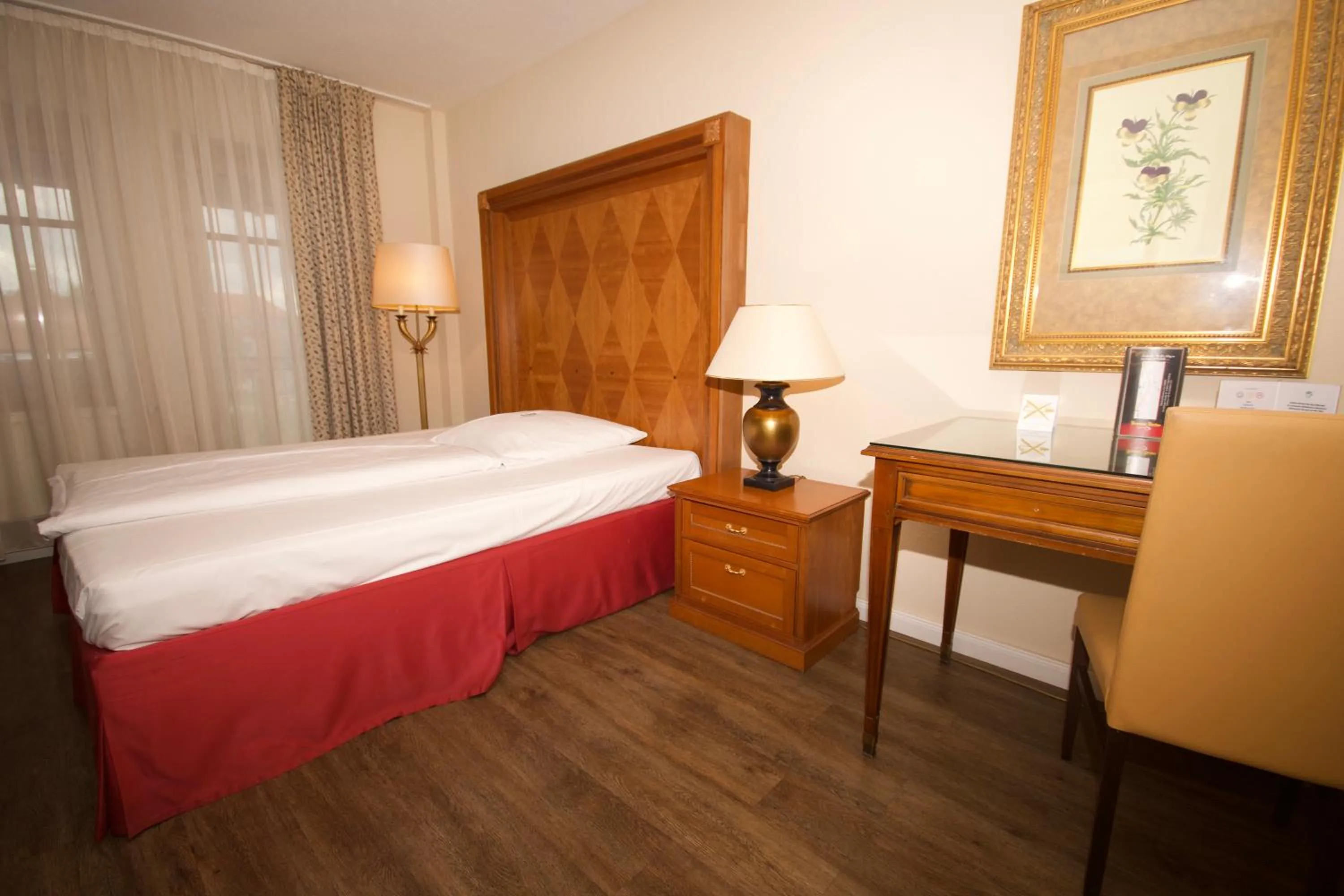 Bed in Gästehaus Bavaria