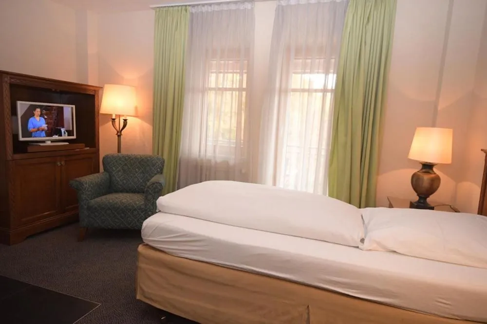 Photo of the whole room, Bed in Gästehaus Bavaria