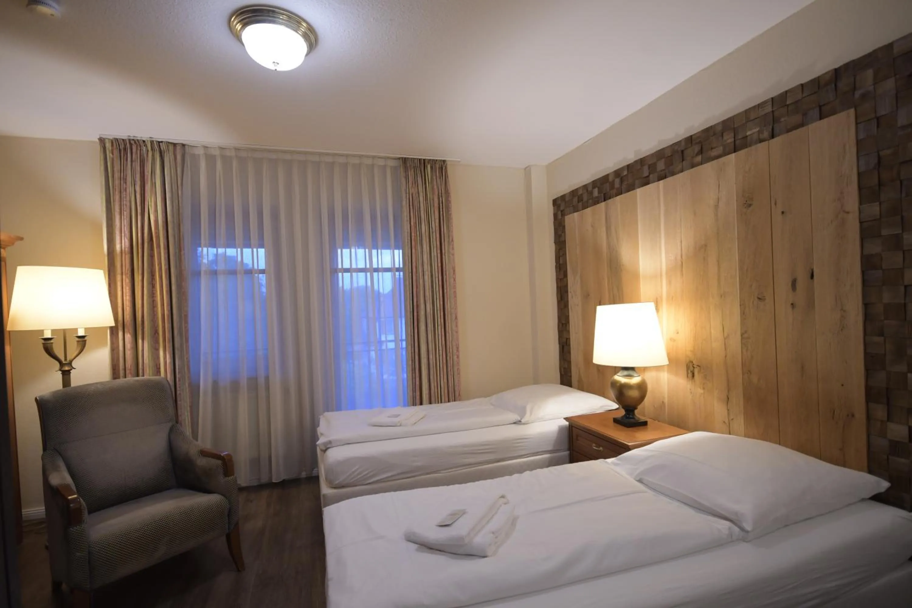 Photo of the whole room, Bed in Gästehaus Bavaria