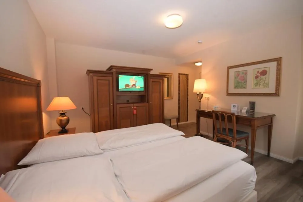 Photo of the whole room, Bed in Gästehaus Bavaria