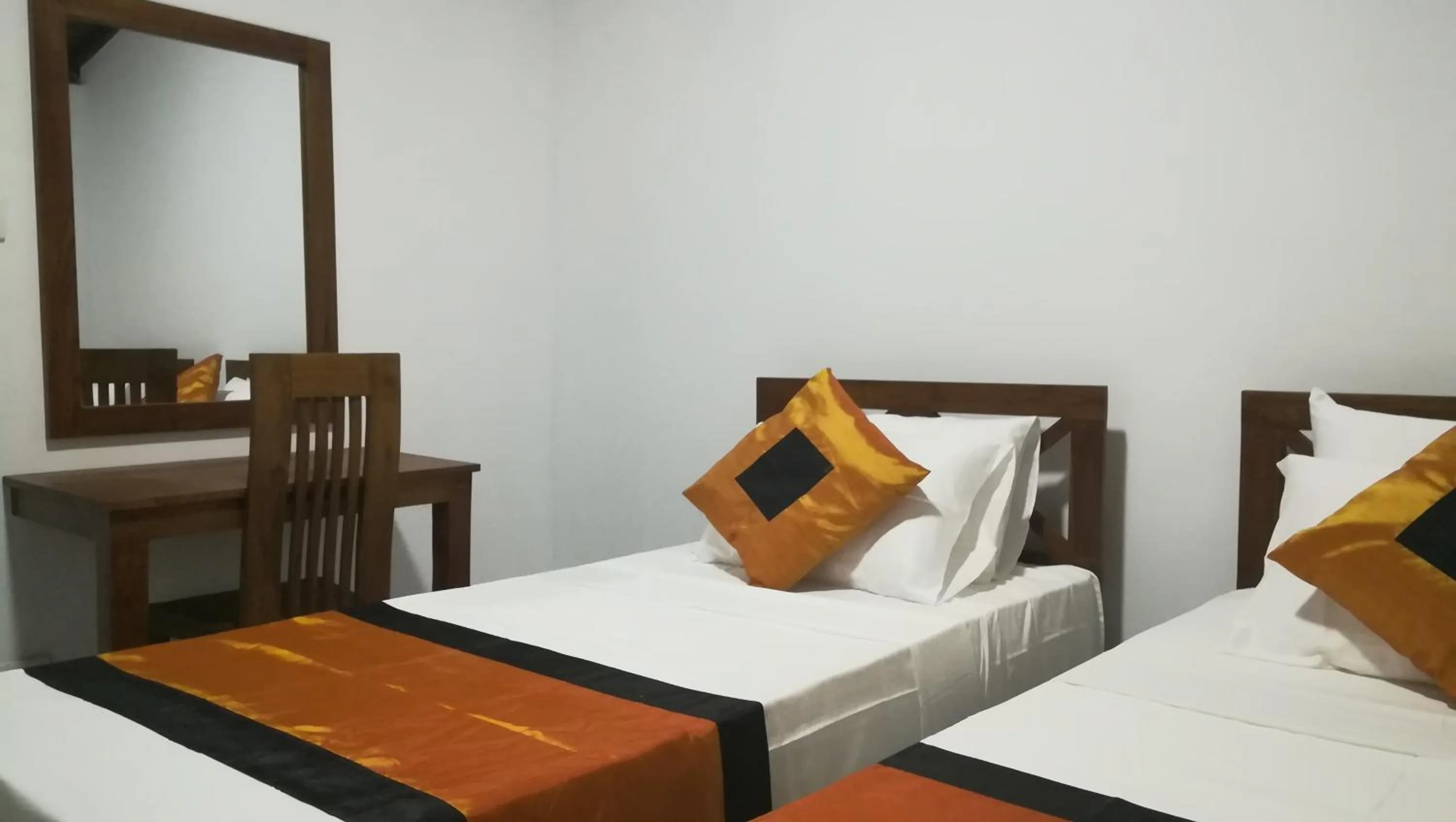 Bed in Tamarind Tamarind Resort, Tourist Board Approved