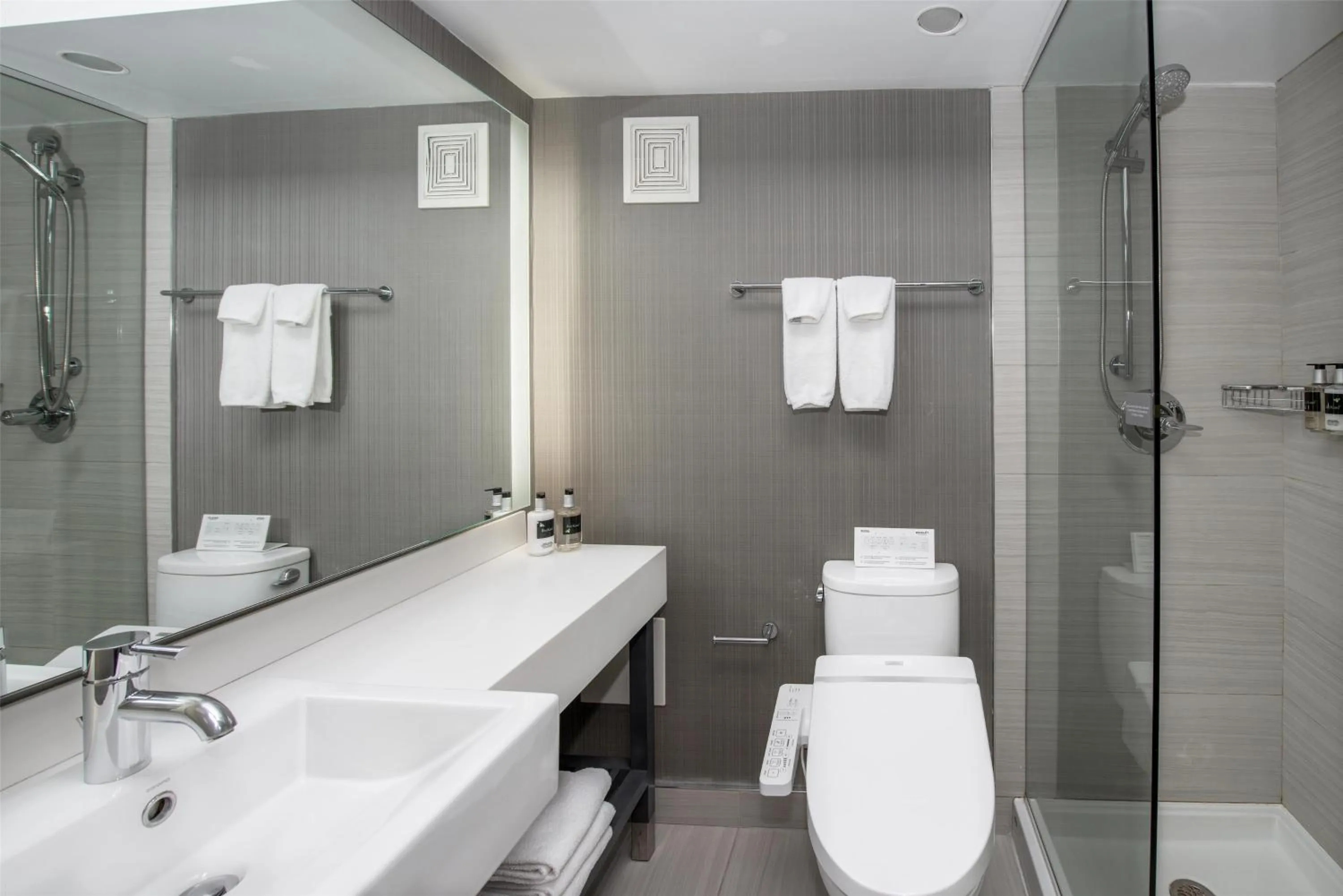 Bathroom in Coast Prince George Hotel by APA